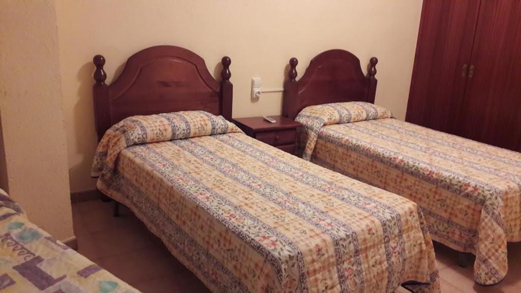 Habitación Triple Básica con Baño Compartido