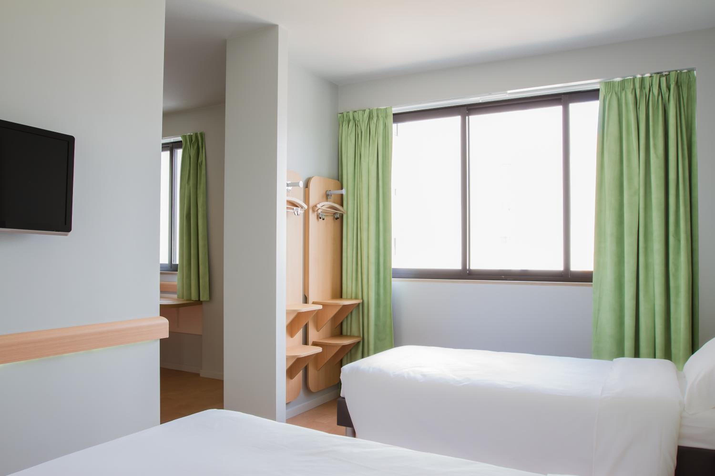 Standard Room with Double Bed and Single Bed - Photo 1