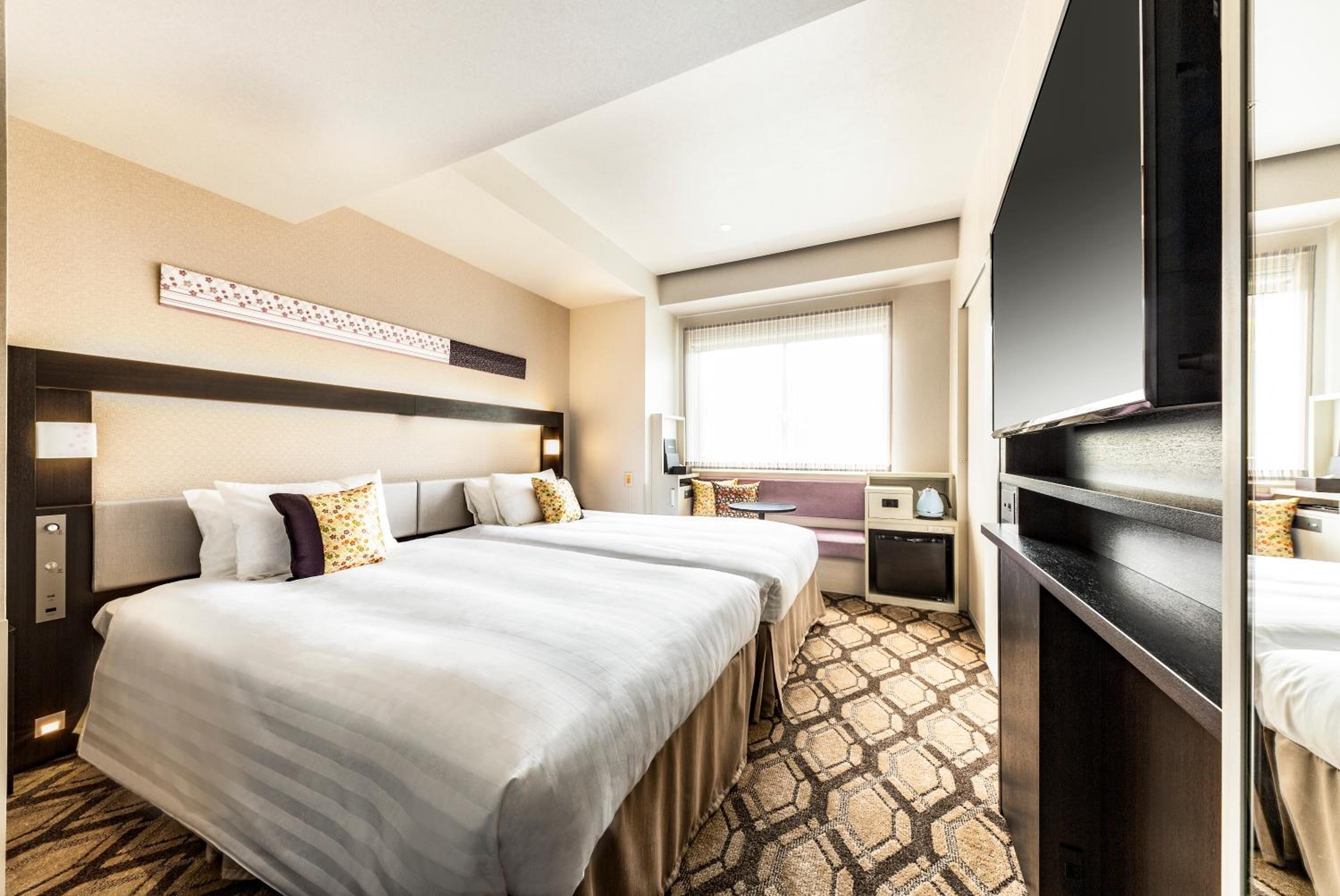 Universal Twin Room - Non-Smoking photo 1