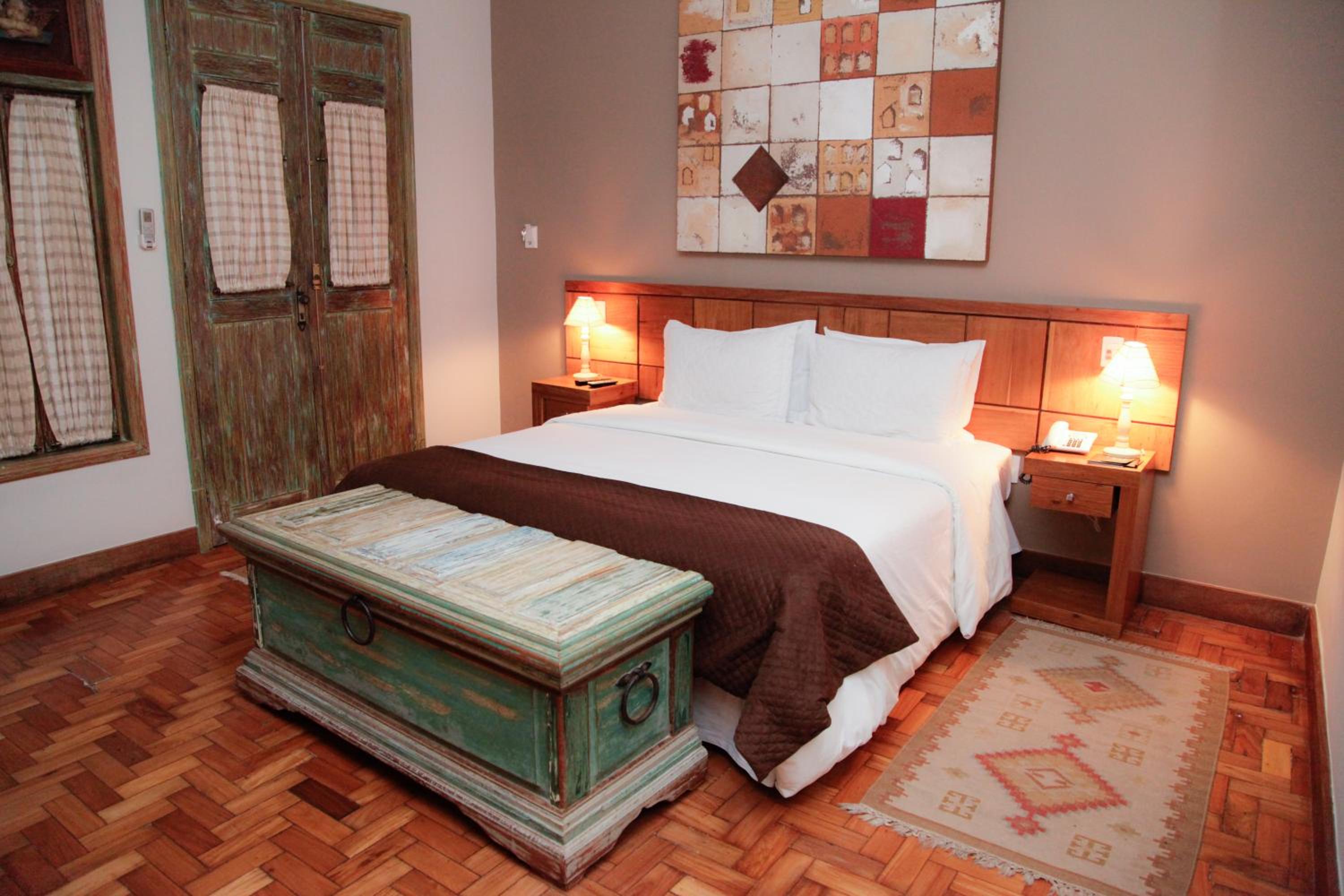 Quarto Luxo Superior Triplo com Banheira photo 1