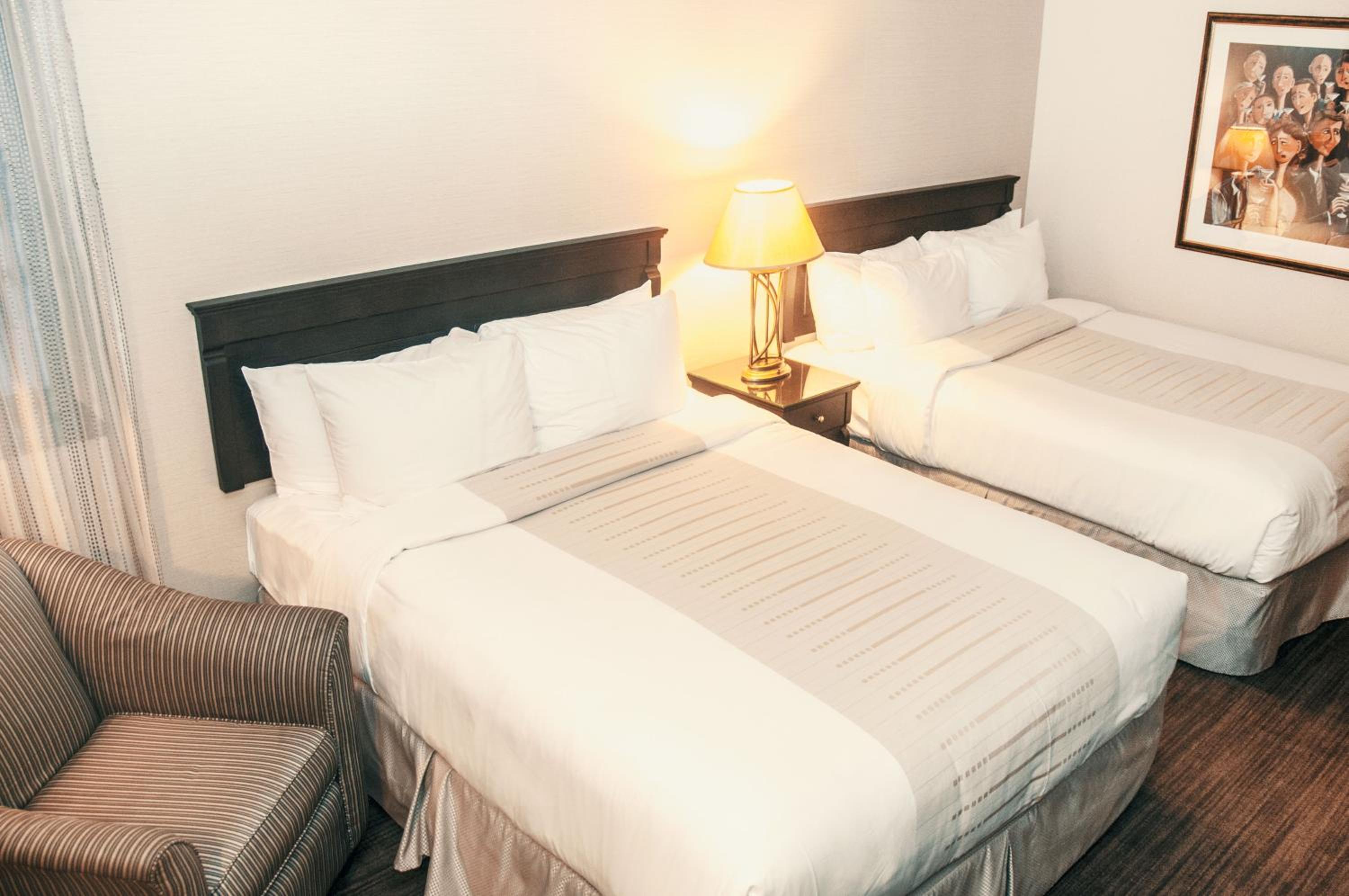 Economy Queen Room with Two Queen Beds  - Photo 2