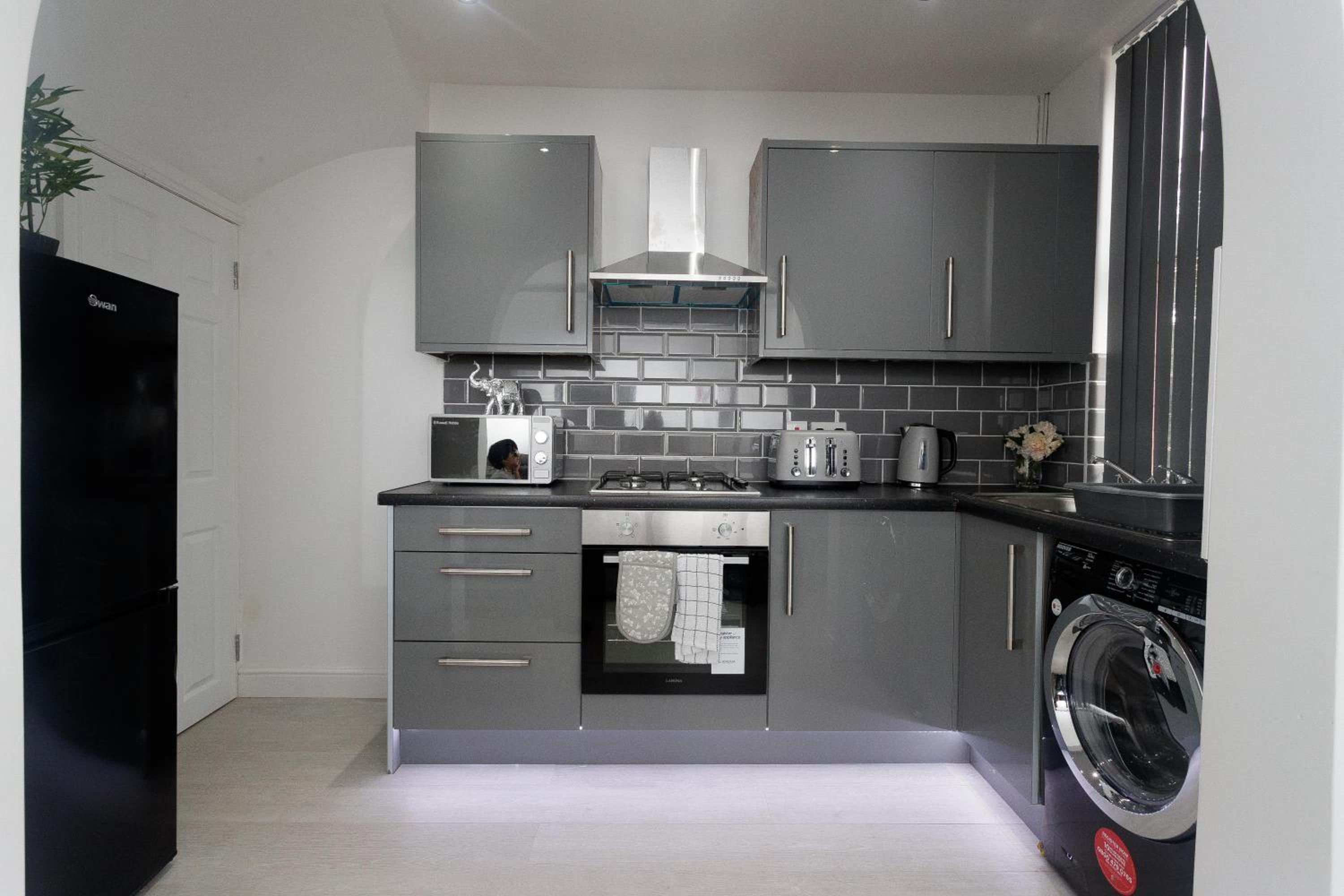 Three-Bedroom Apartment - Photo 5