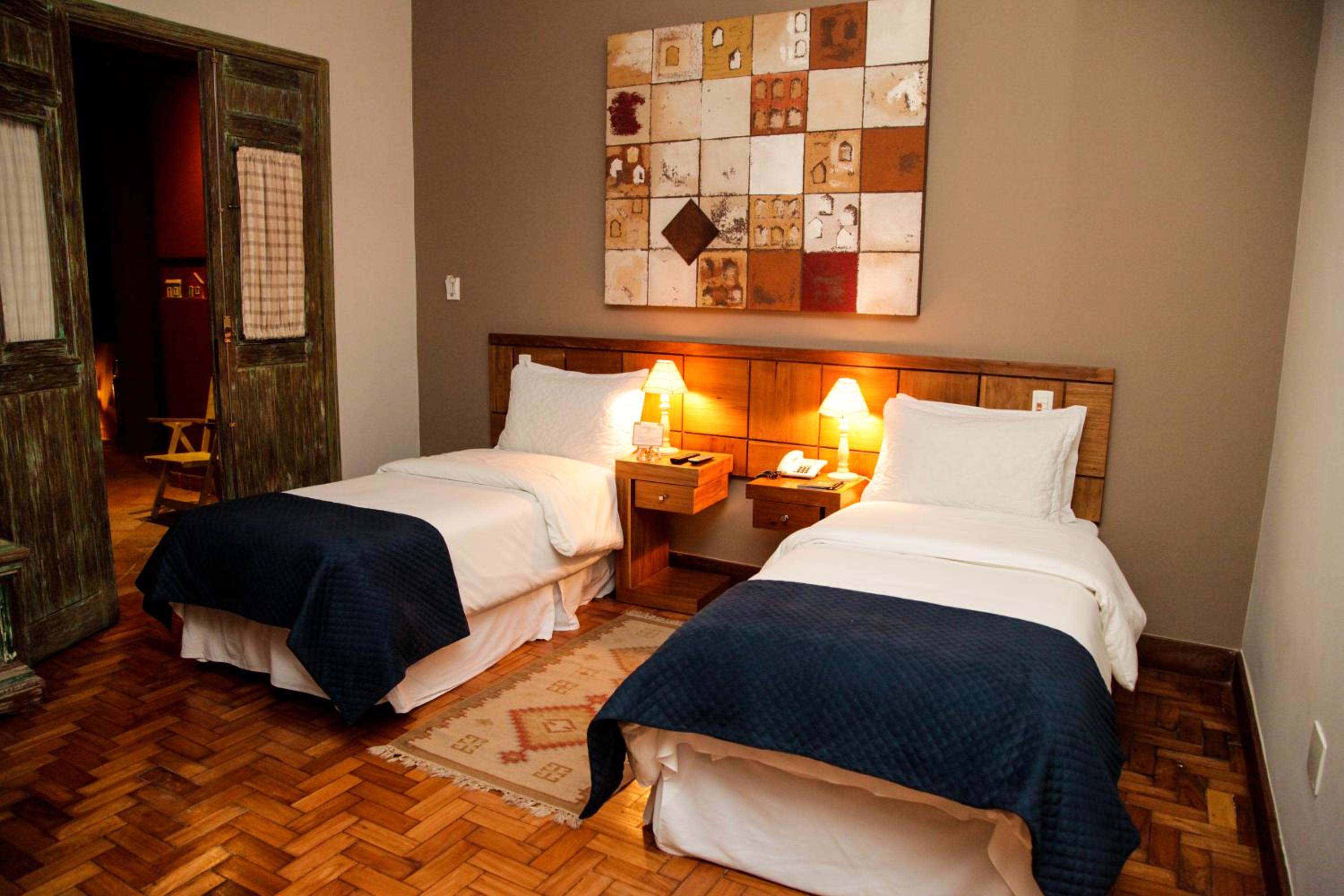 Quarto Luxo Superior Triplo com Banheira photo 3