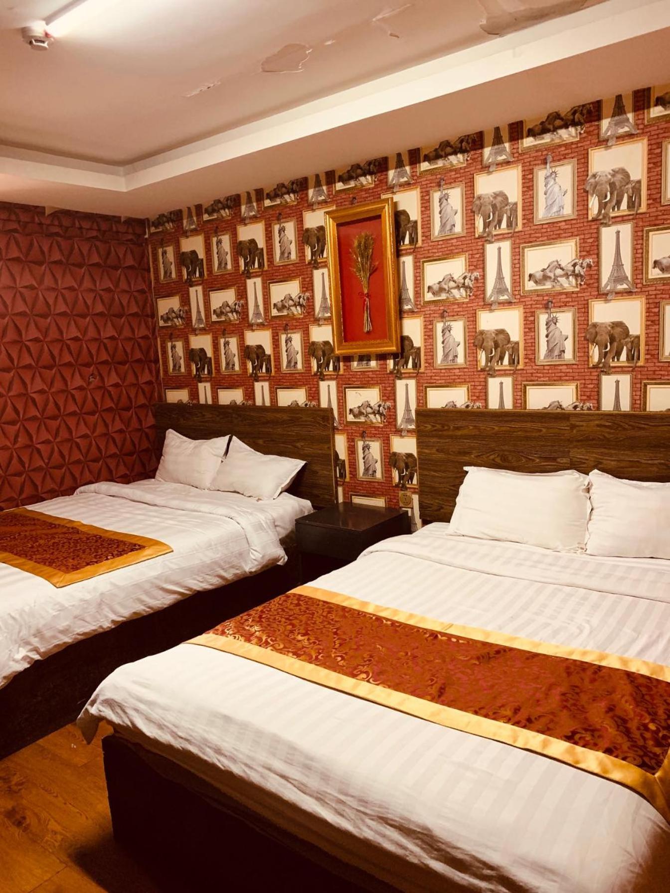 Deluxe Queen Room with Two Queen Beds photo 1
