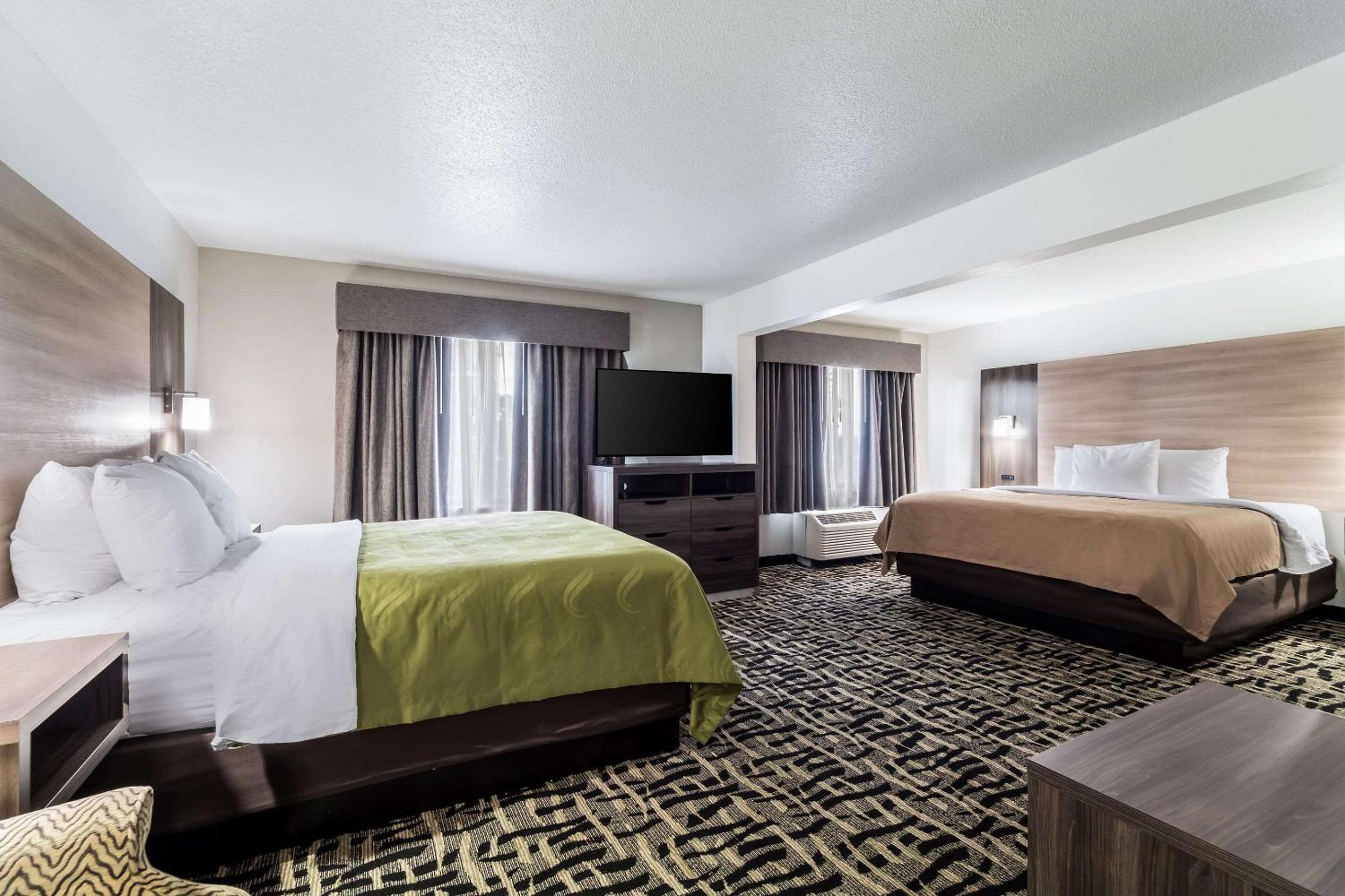 Suite with King Bed and Queen Bed - Non-Smoking - Photo 1