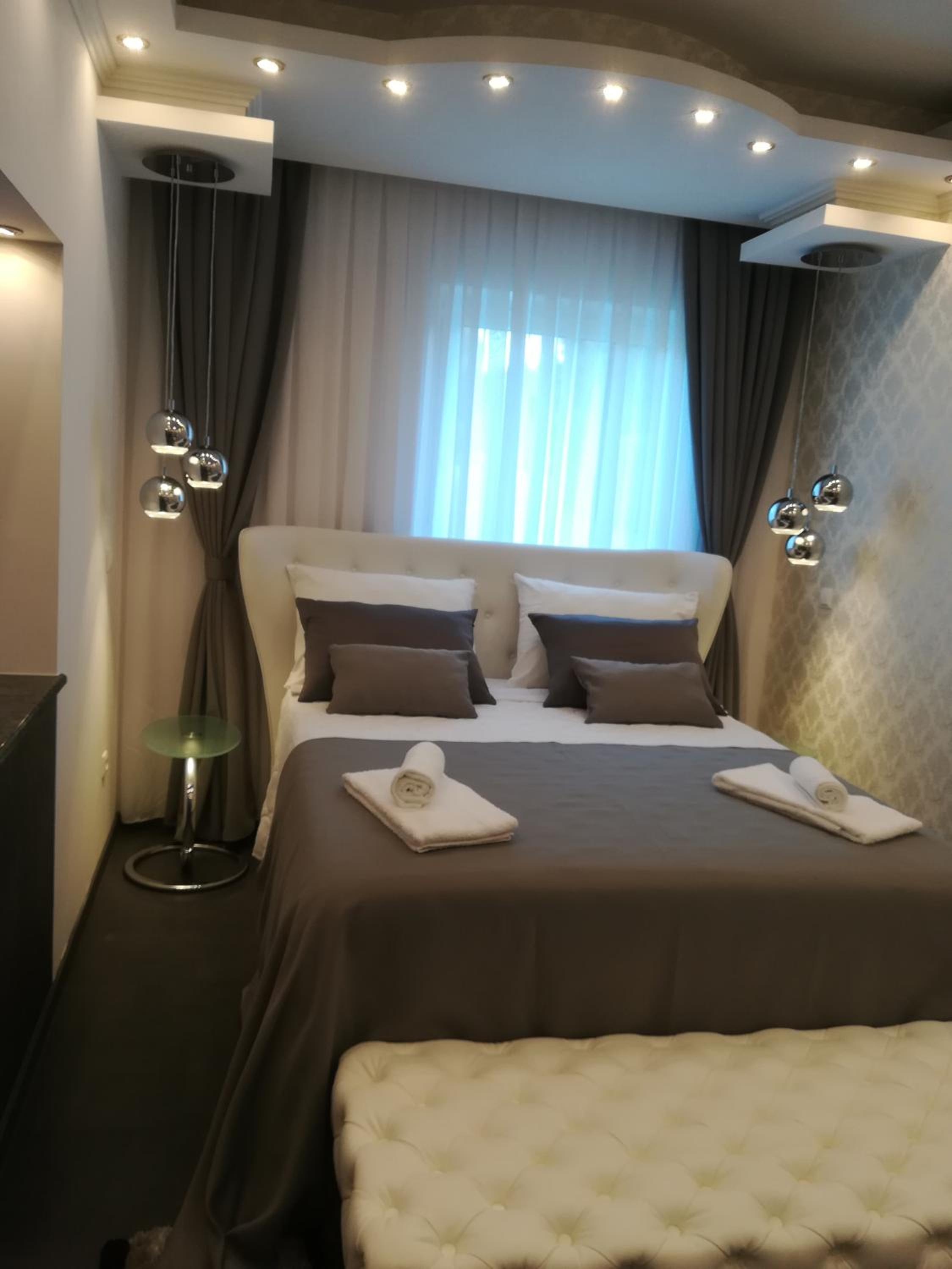 Luxury Quadruple Room - Photo 9