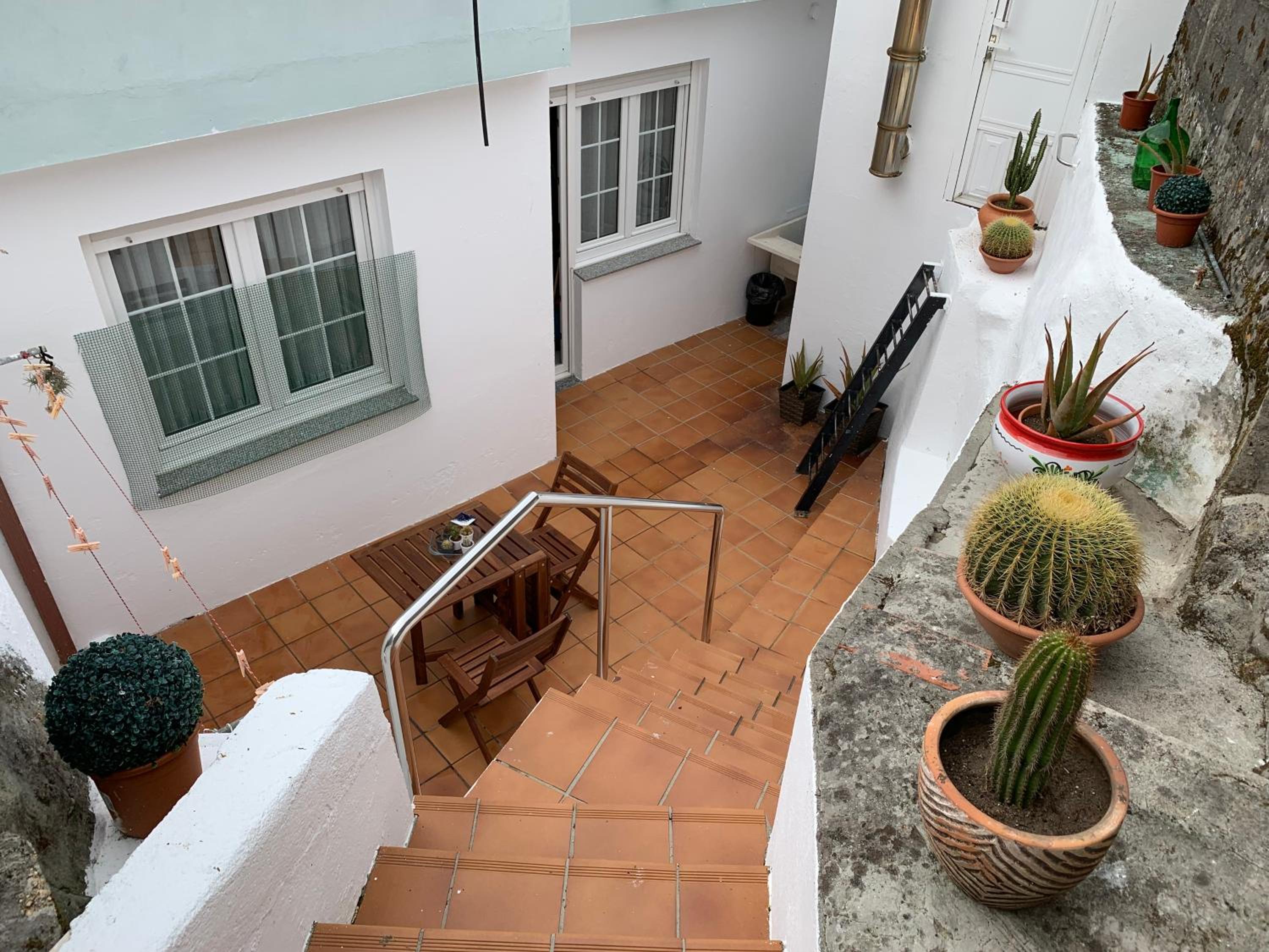 Three-Bedroom House - Photo 24