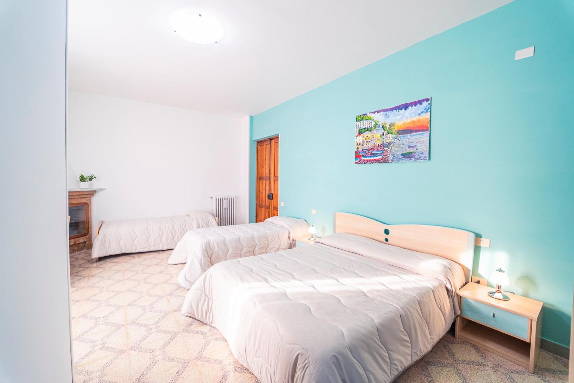 Quadruple Room with Balcony