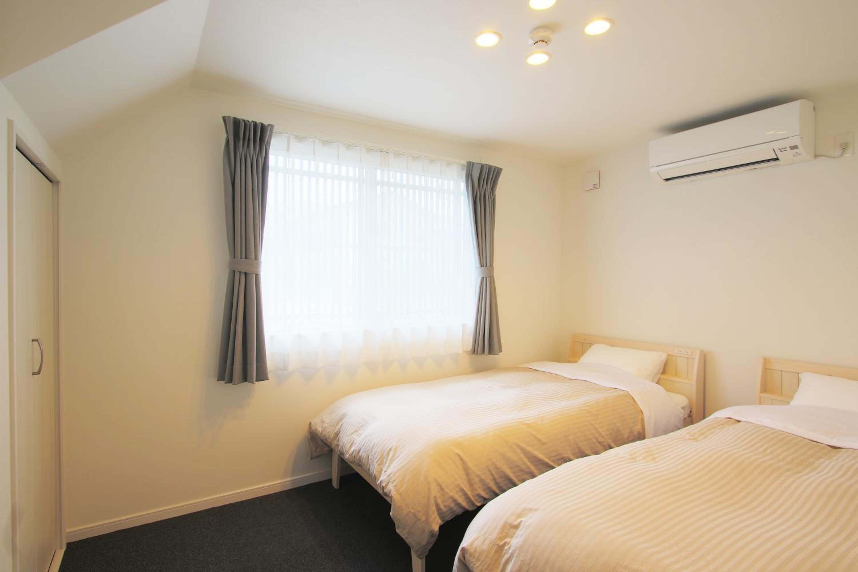 Three-Bedroom House - Photo 8