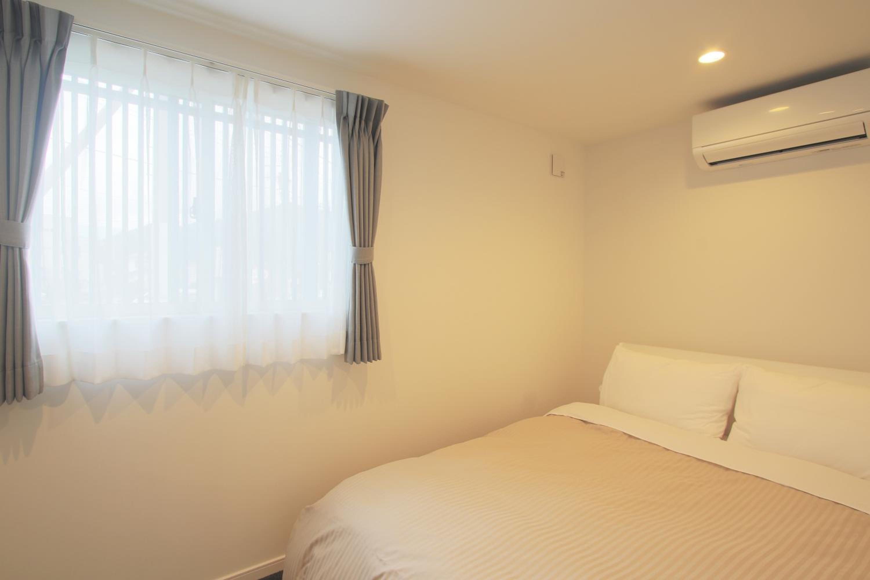 Three-Bedroom House - Photo 7