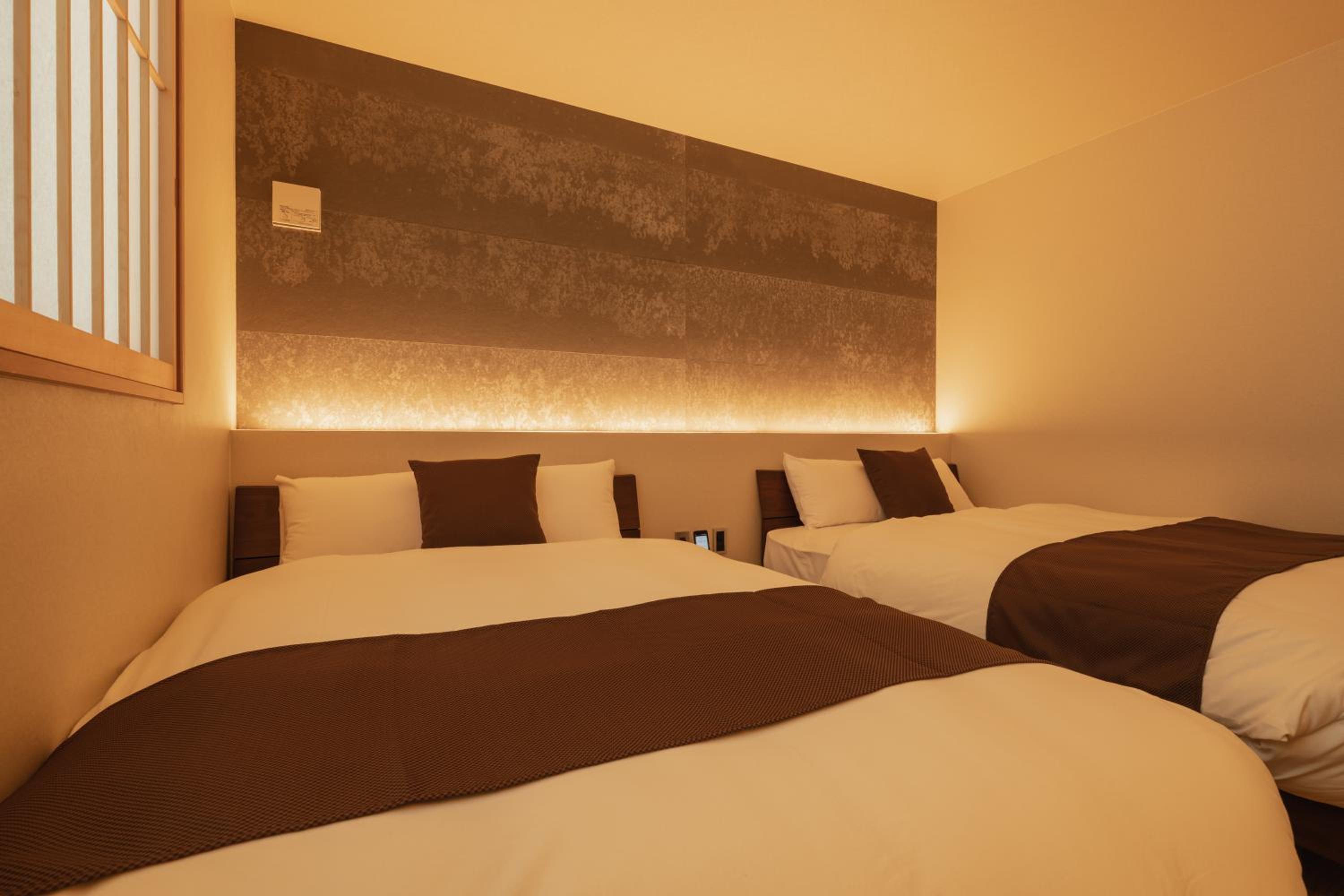 Economy Quadruple Room - Photo 6