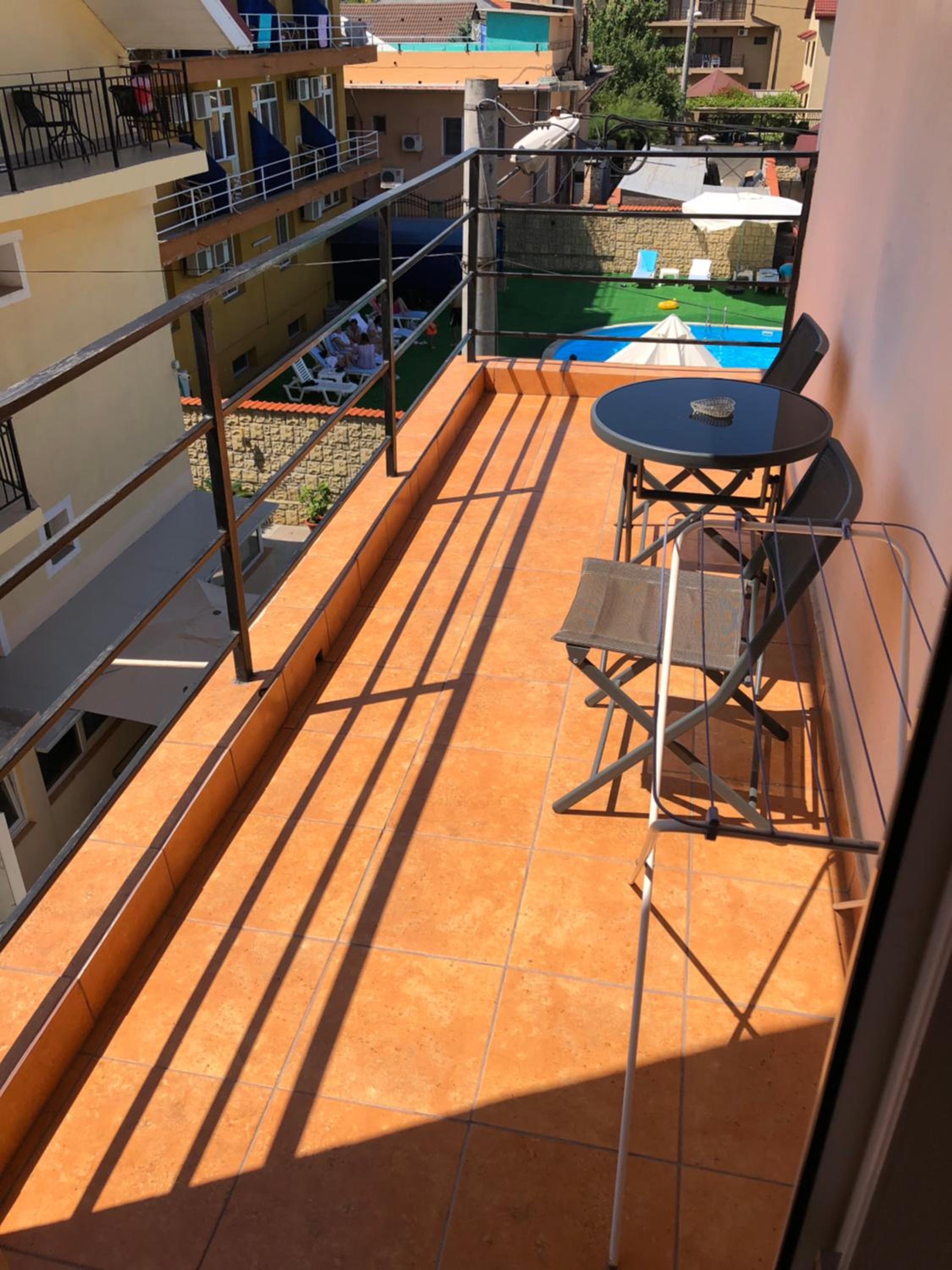 Triple Room with Balcony - Photo 11