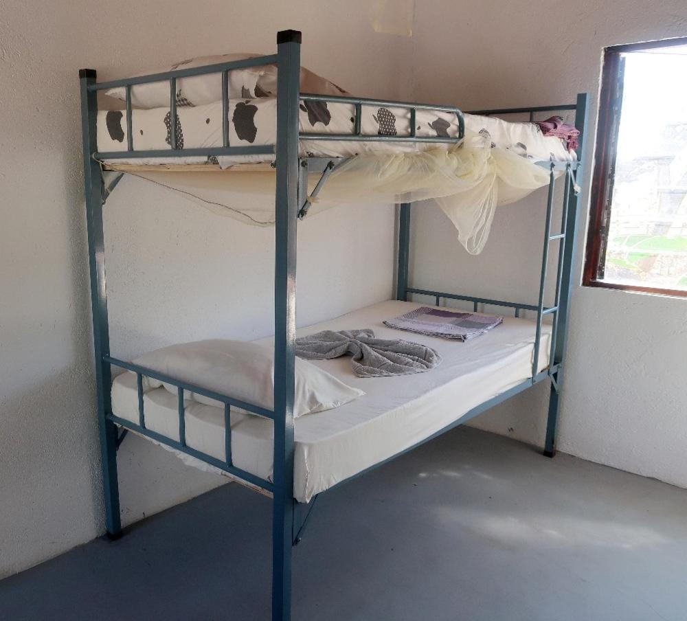 Single Bed in Dormitory Room