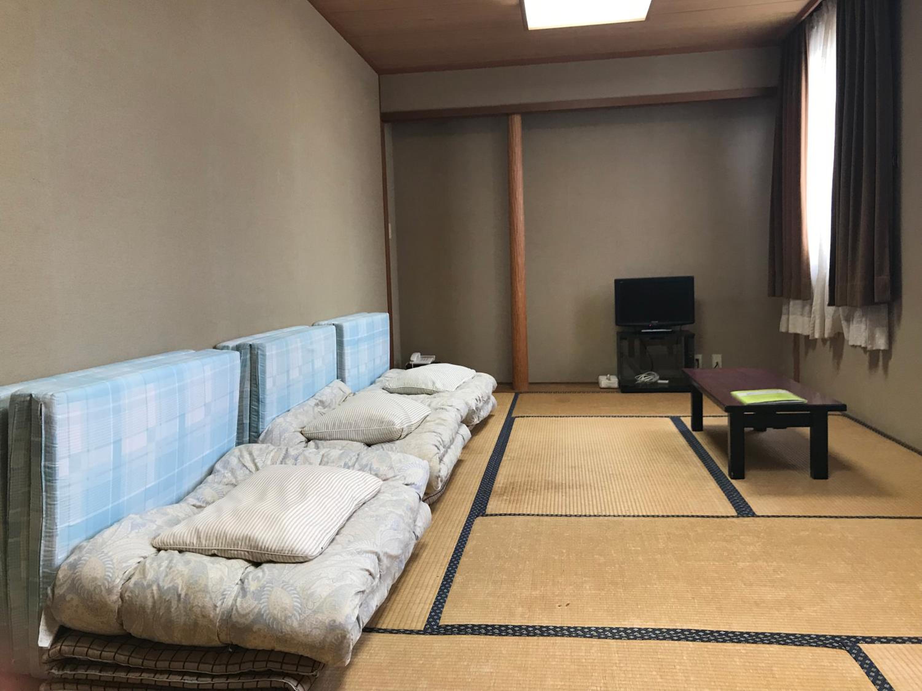 Single Futon in Japanese-Style Female Dormitory Room photo 3
