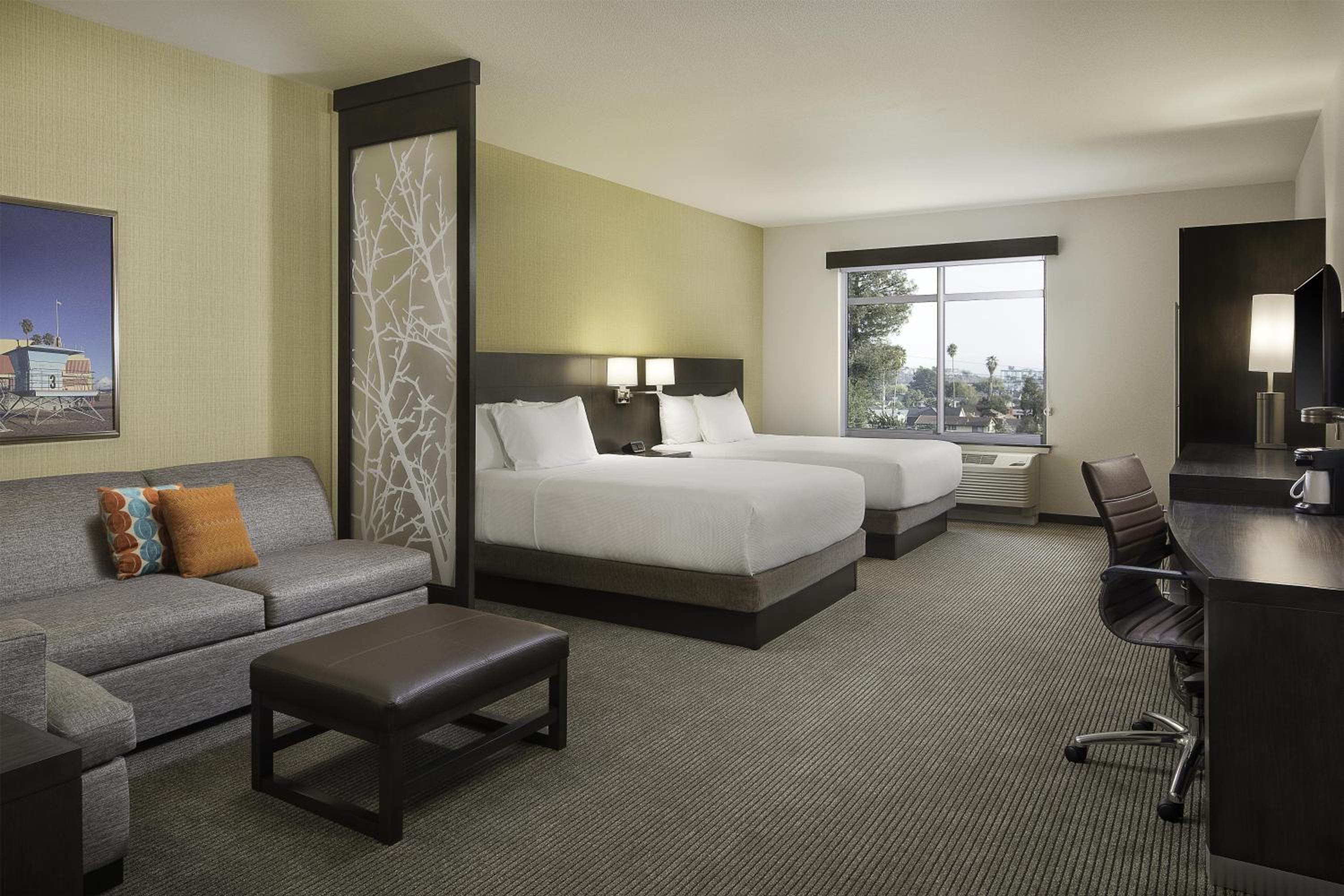 Deluxe Queen Room with Two Queen Beds and Sofa Bed