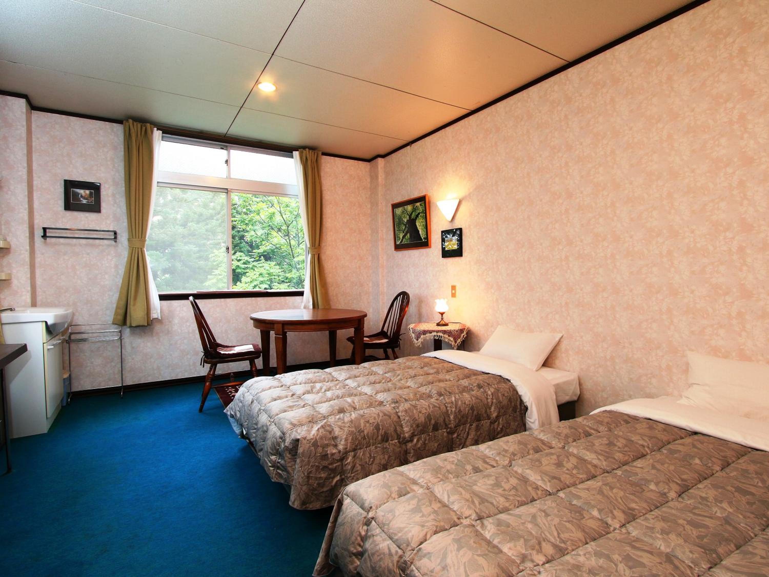 Twin Room with Shared Bathroom photo 2