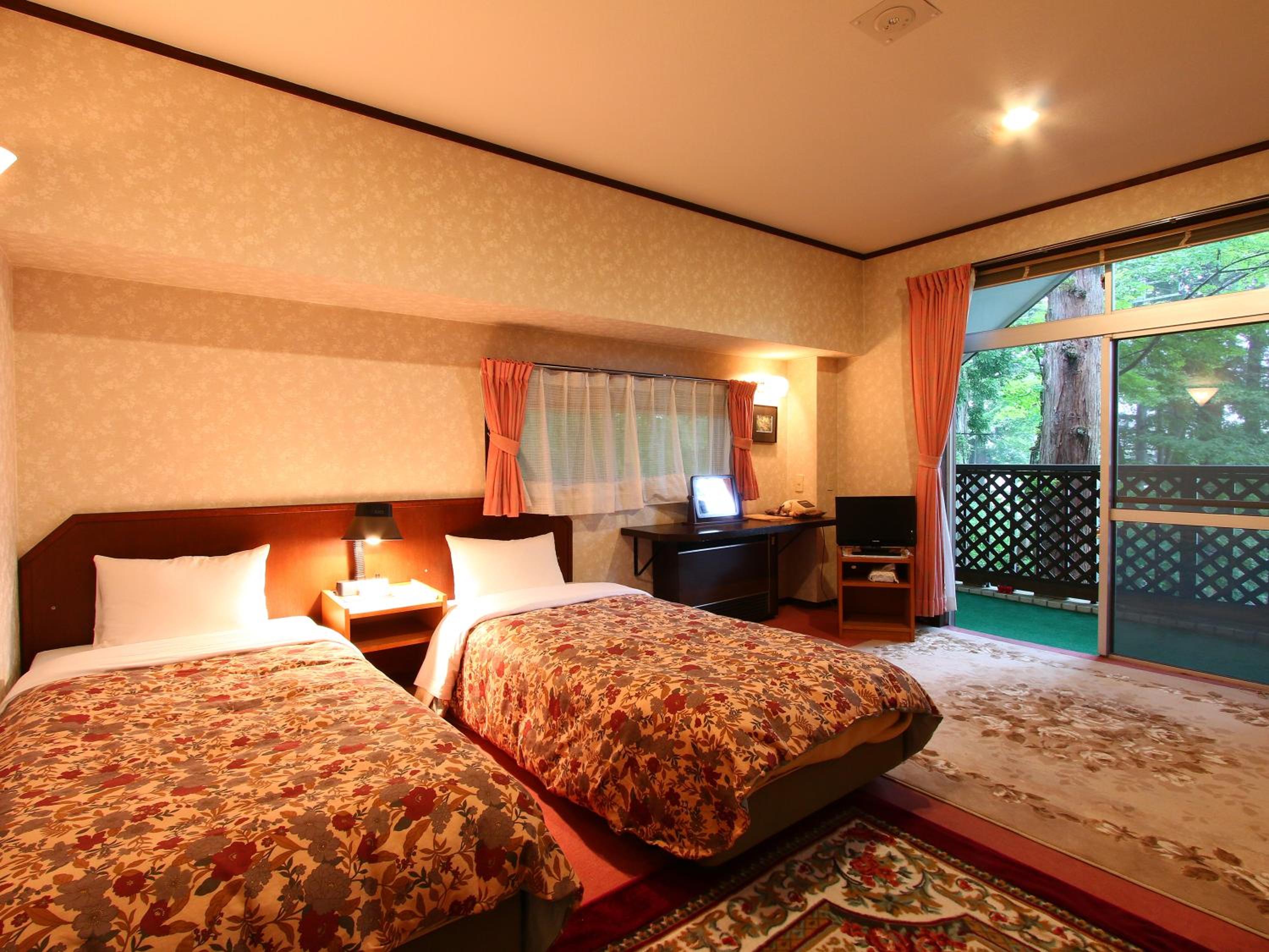 Twin Room - Photo 1