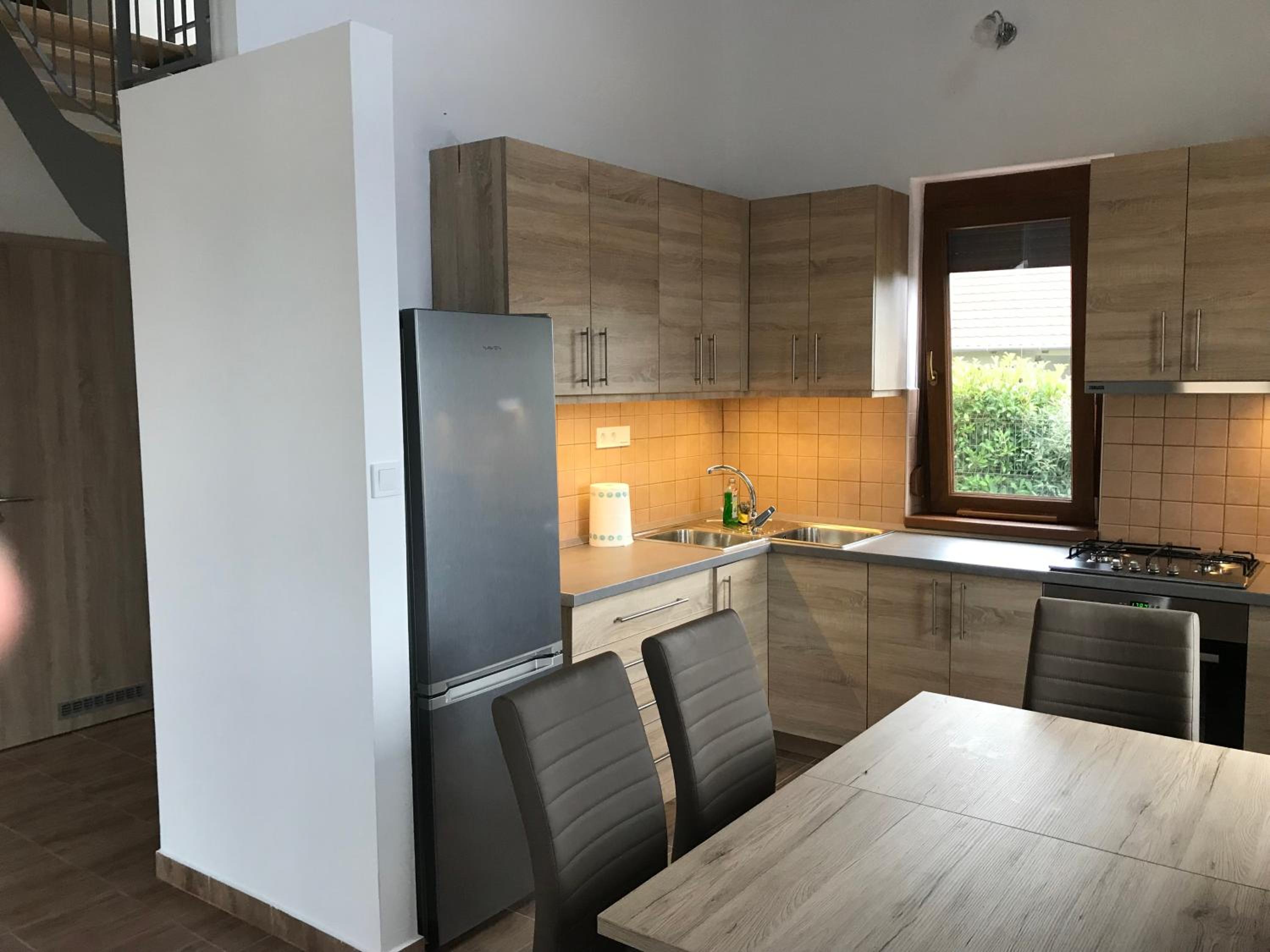 Three-Bedroom House - Photo 30