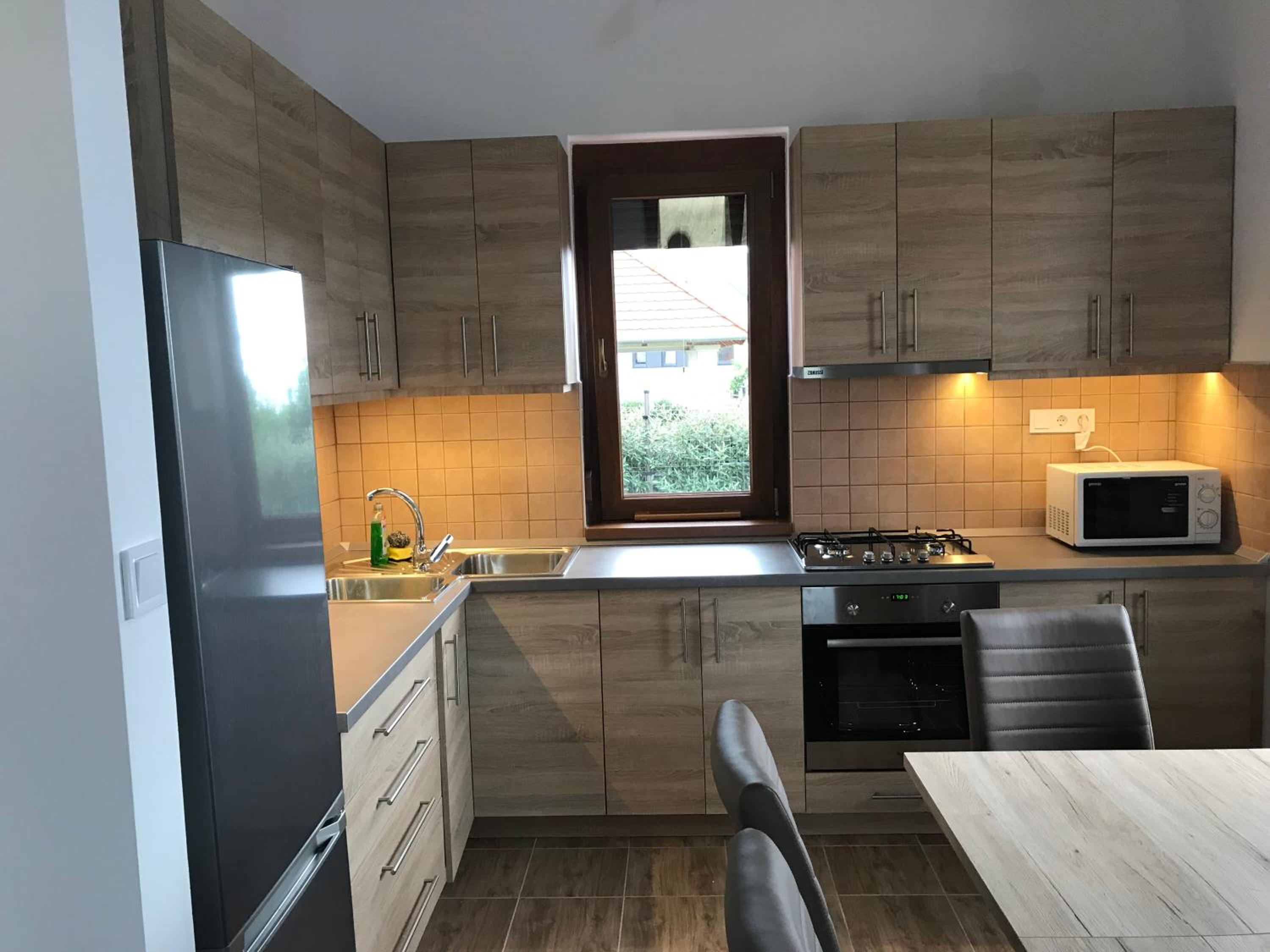 Three-Bedroom House - Photo 12