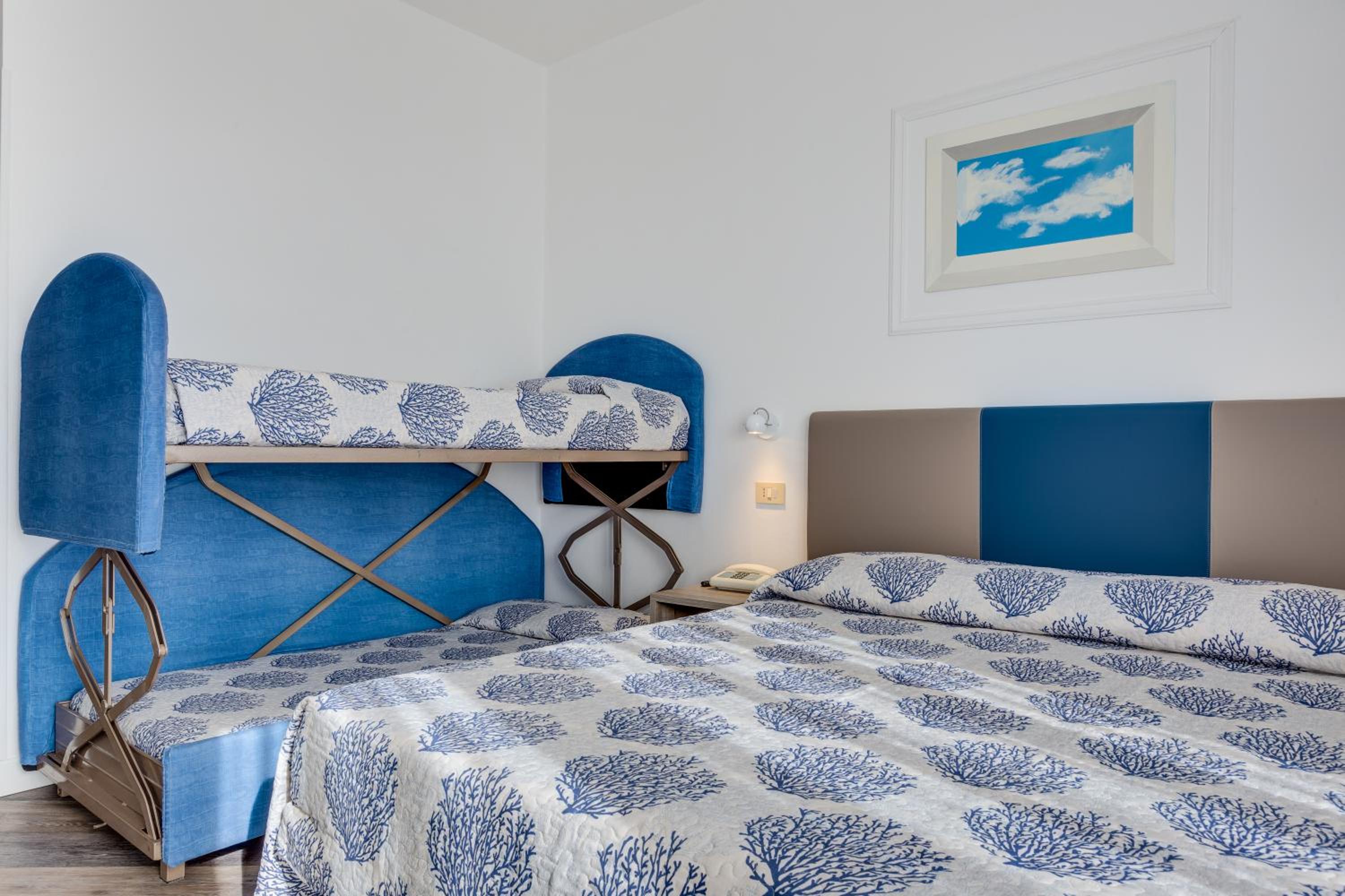 Standard Quadruple Room with Partial Sea View