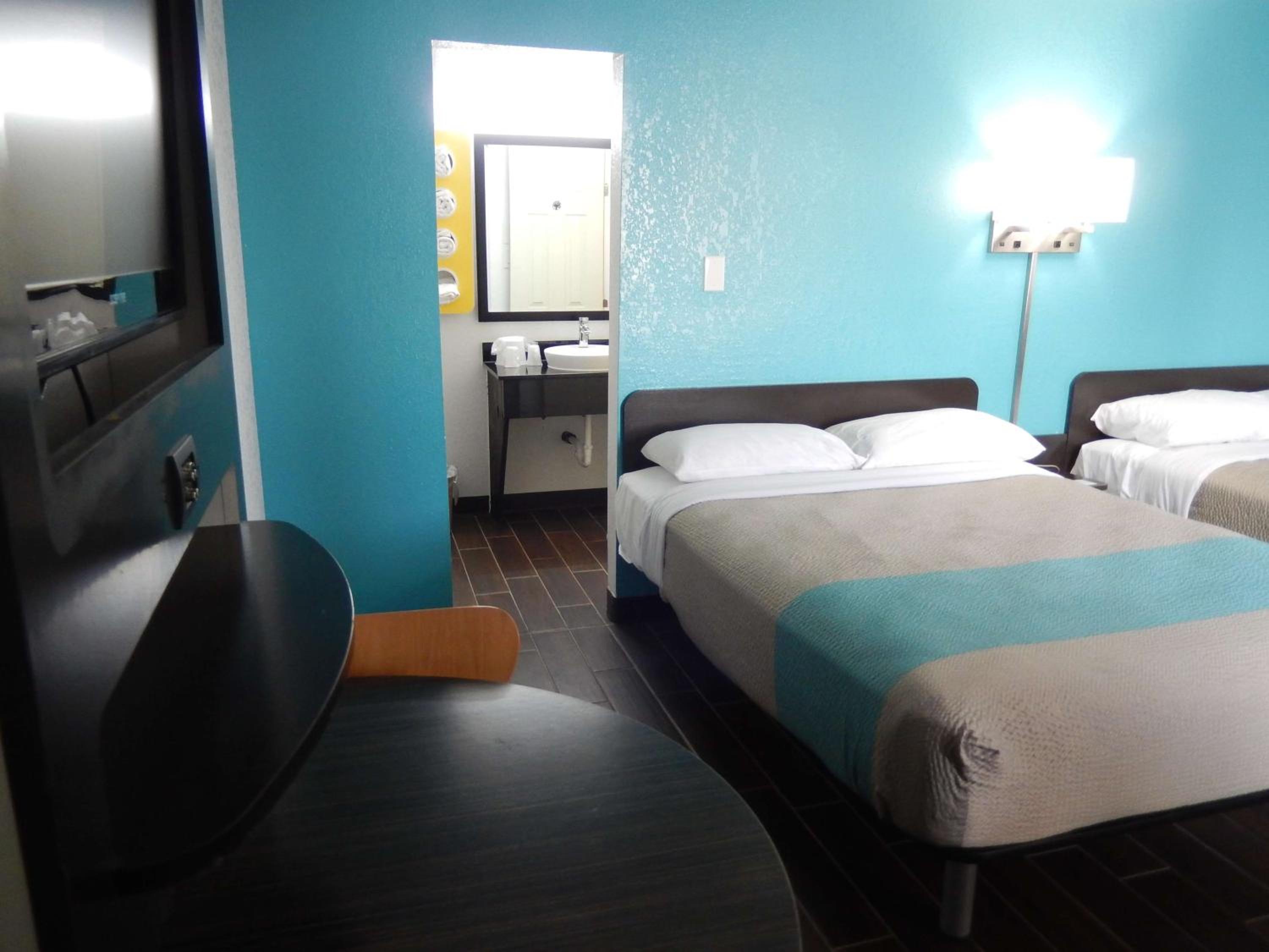 Deluxe Queen Room with Two Queen Beds - Photo 1