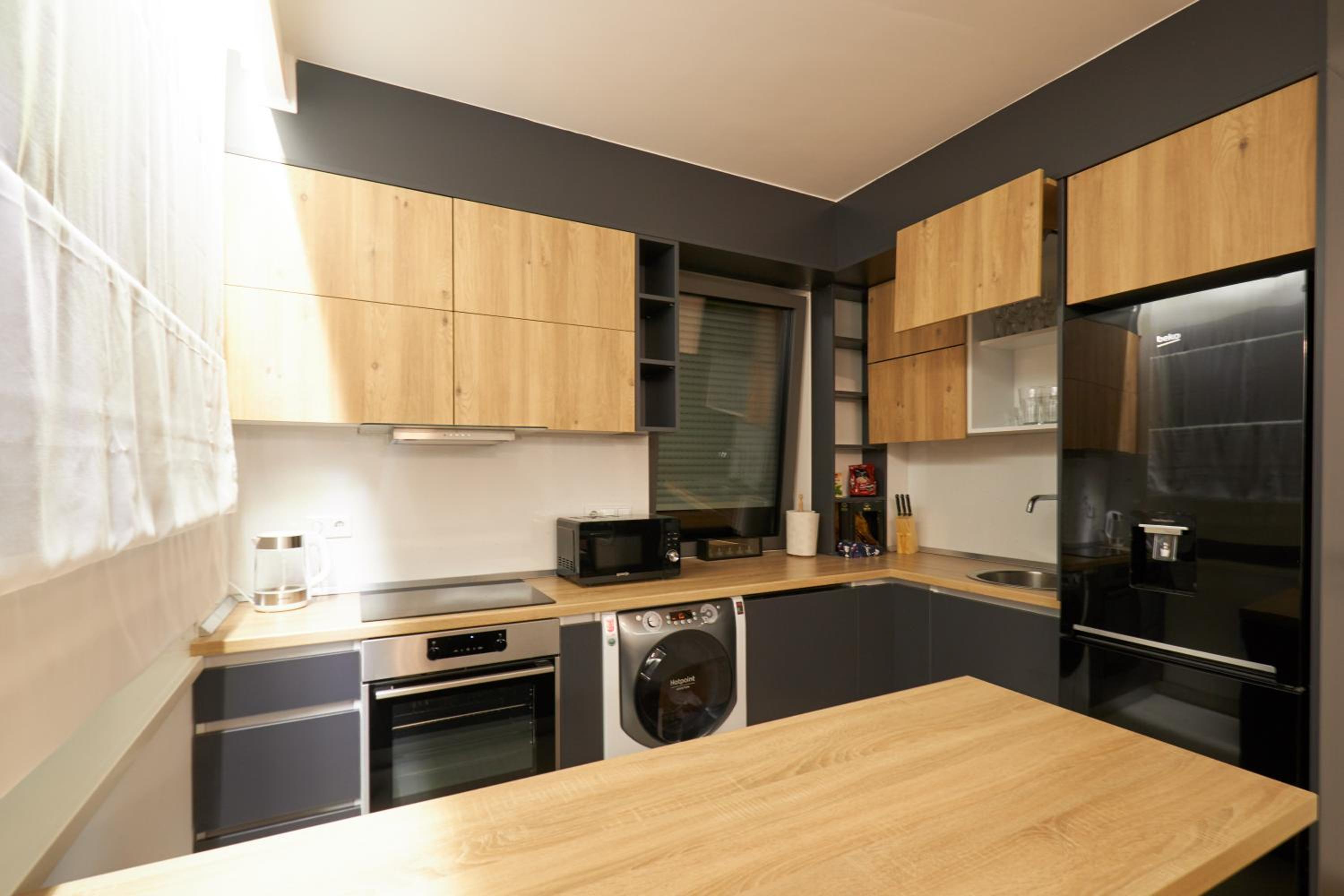 Three-Bedroom Apartment - Photo 42