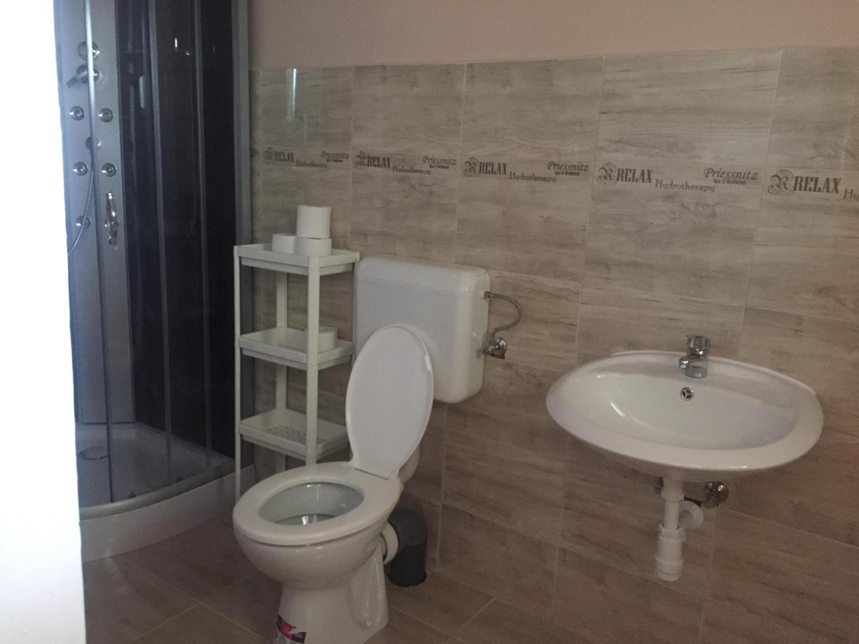 Four-Bedroom House - Photo 57