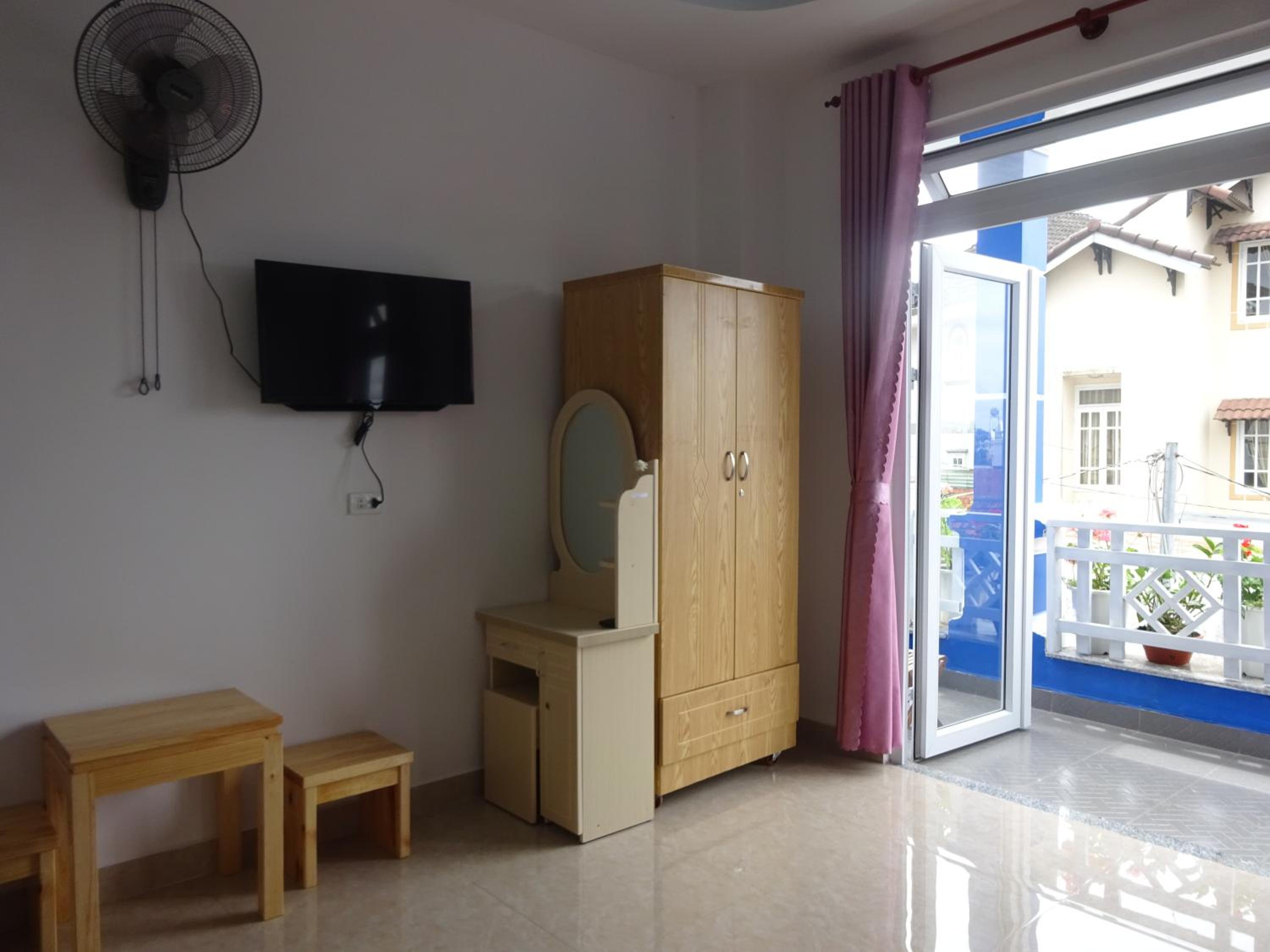 Deluxe Quadruple Room - Photo 22
