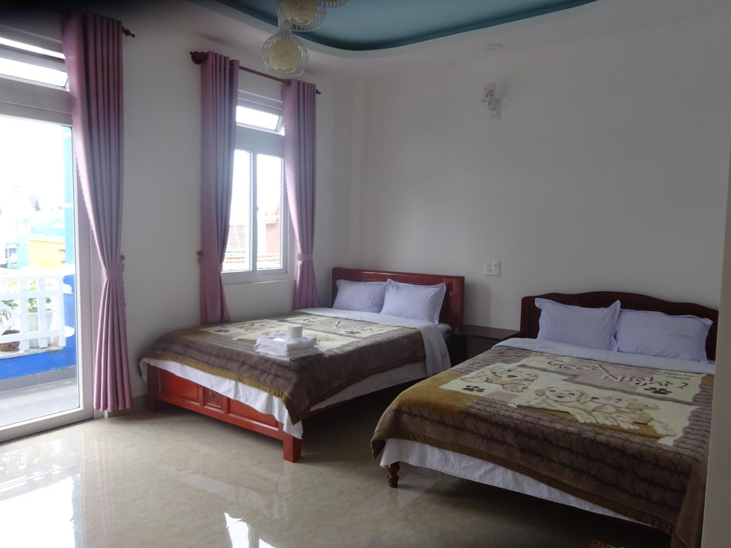 Deluxe Quadruple Room - Photo 5