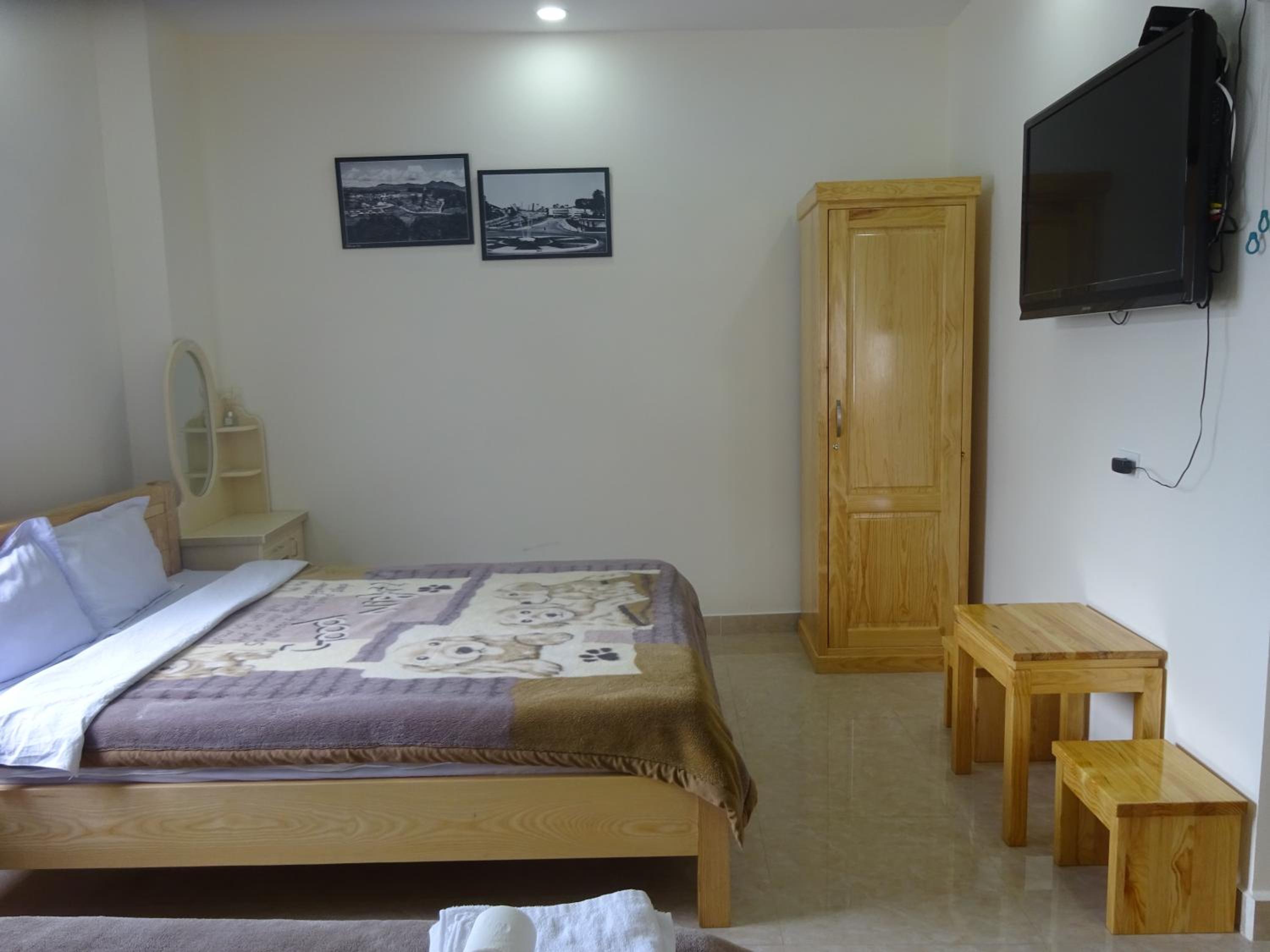 Deluxe Quadruple Room - Photo 6