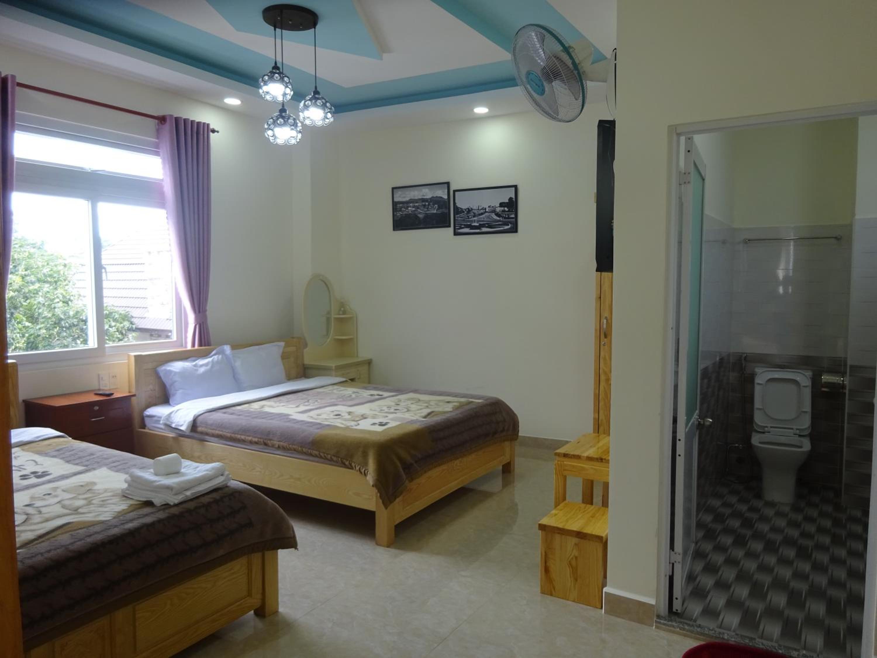 Deluxe Quadruple Room - Photo 9