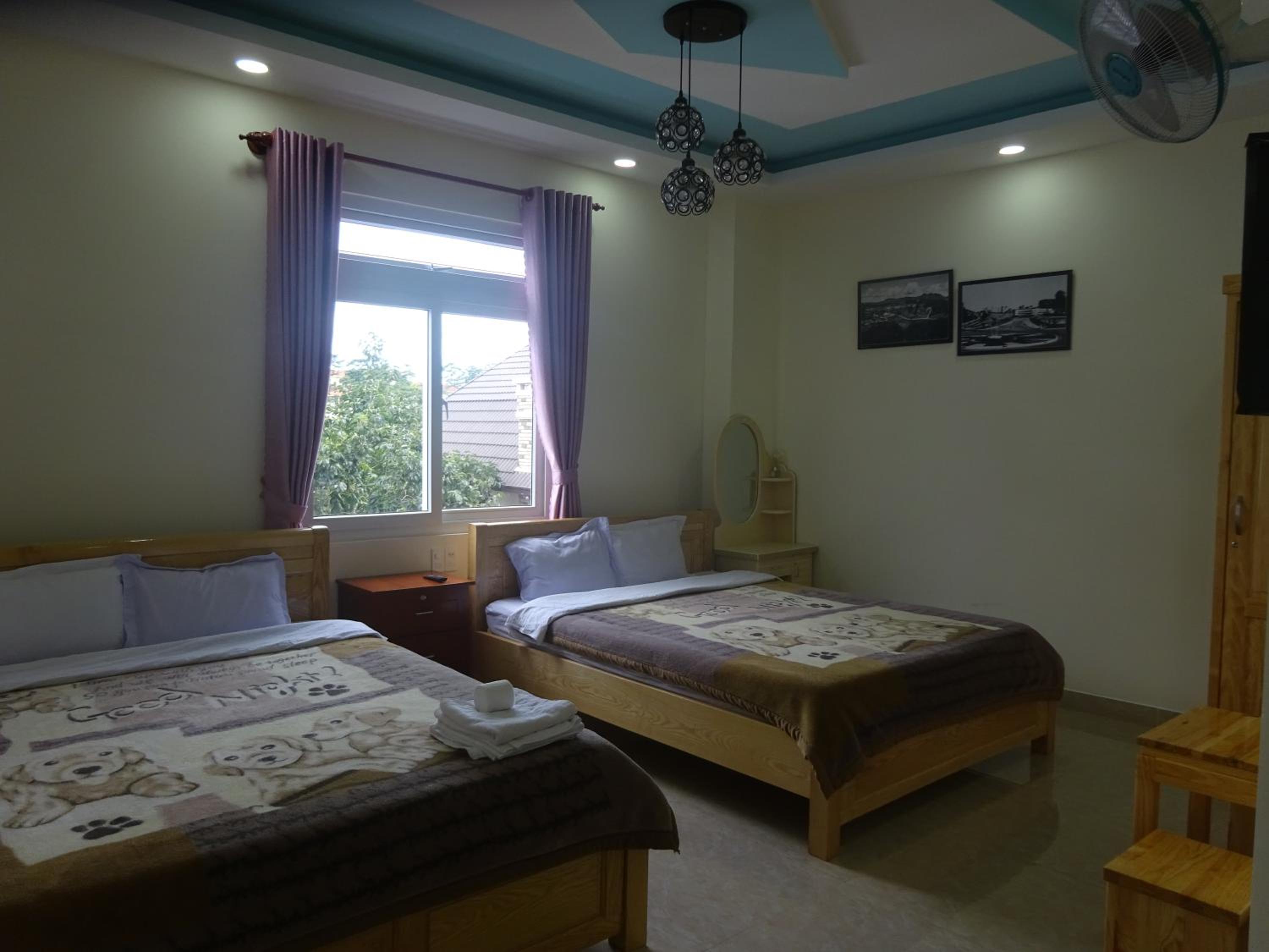 Deluxe Quadruple Room - Photo 10