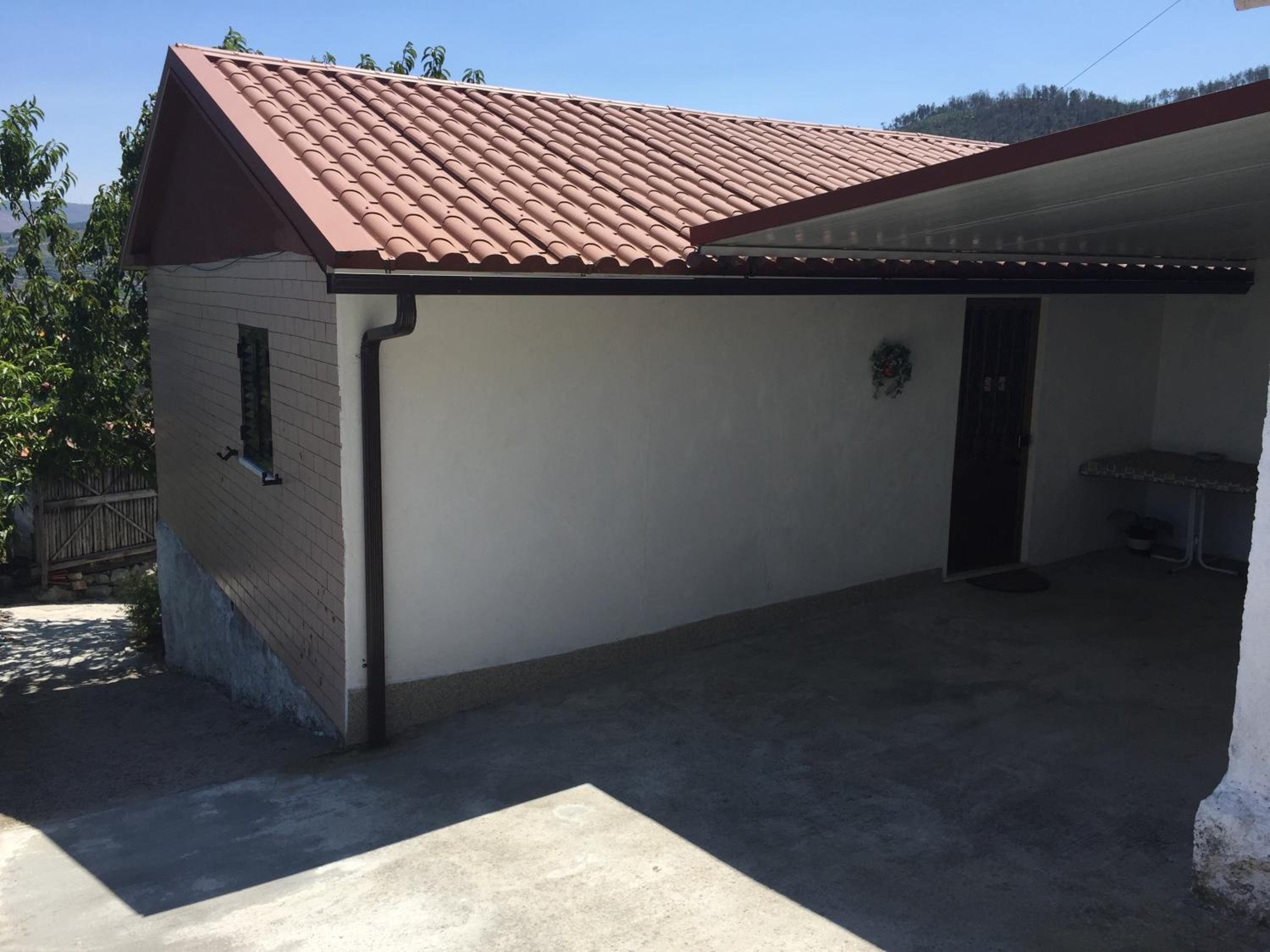 Three-Bedroom House - Photo 36
