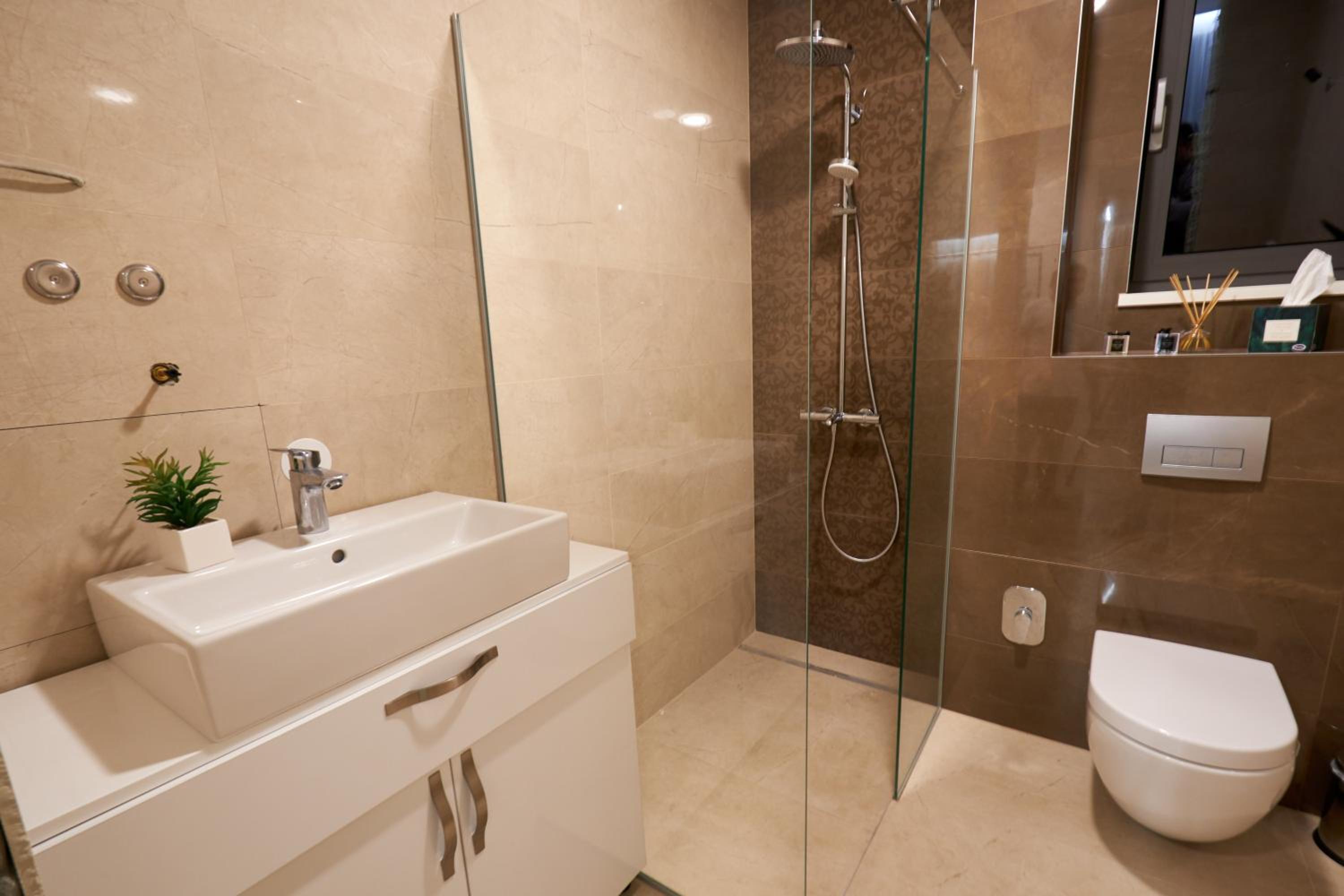 Three-Bedroom Apartment - Photo 41