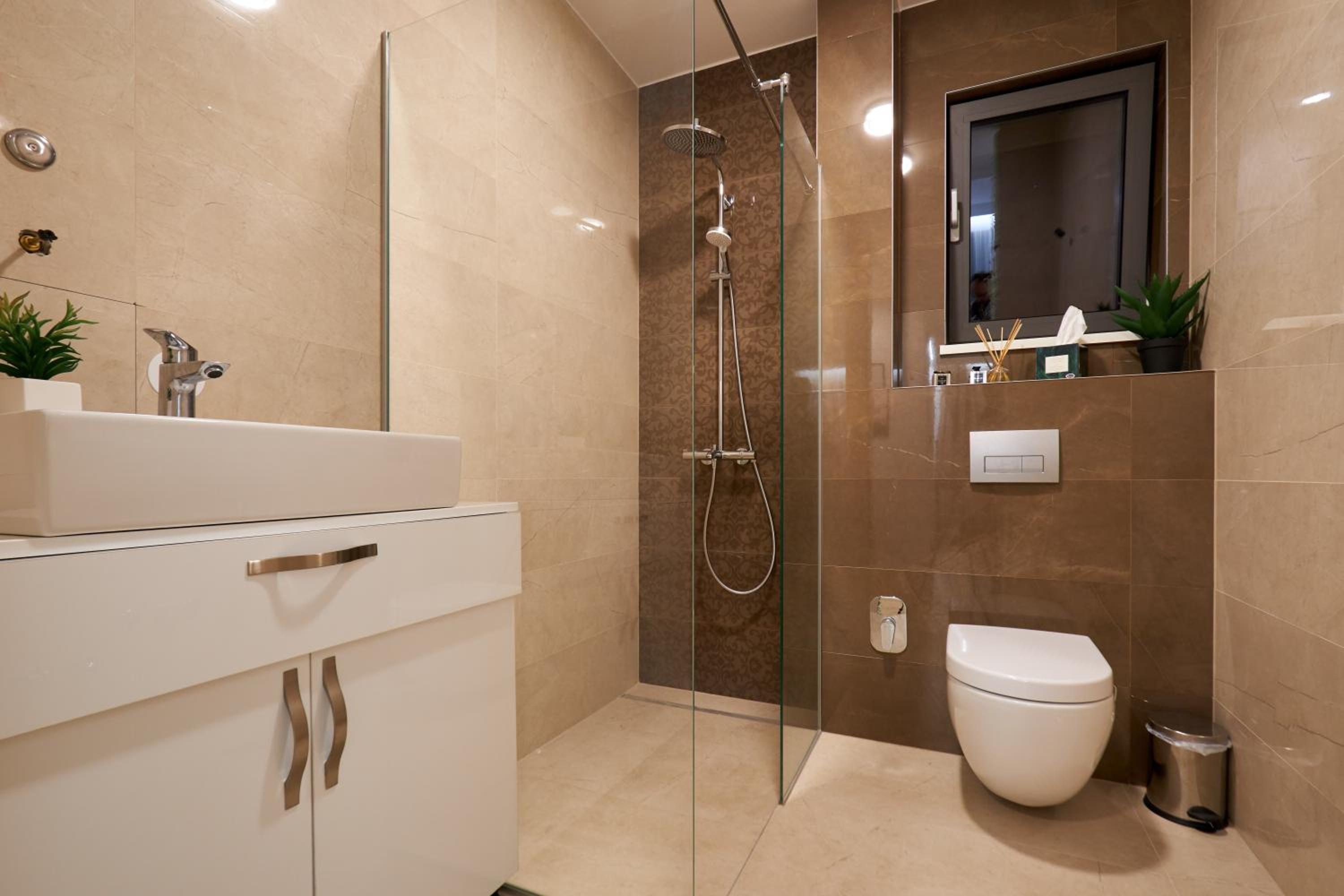 Three-Bedroom Apartment - Photo 29