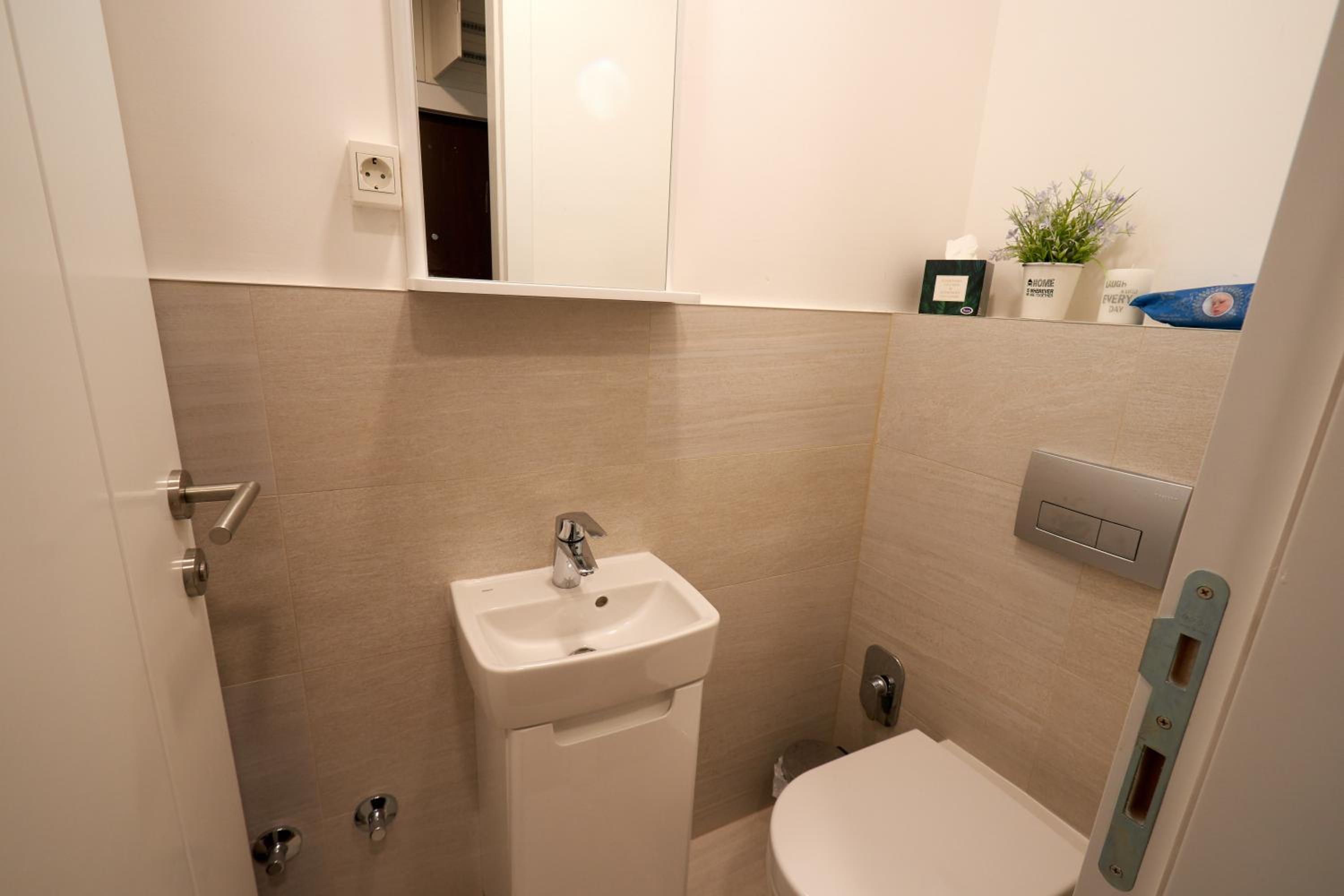 Three-Bedroom Apartment - Photo 30