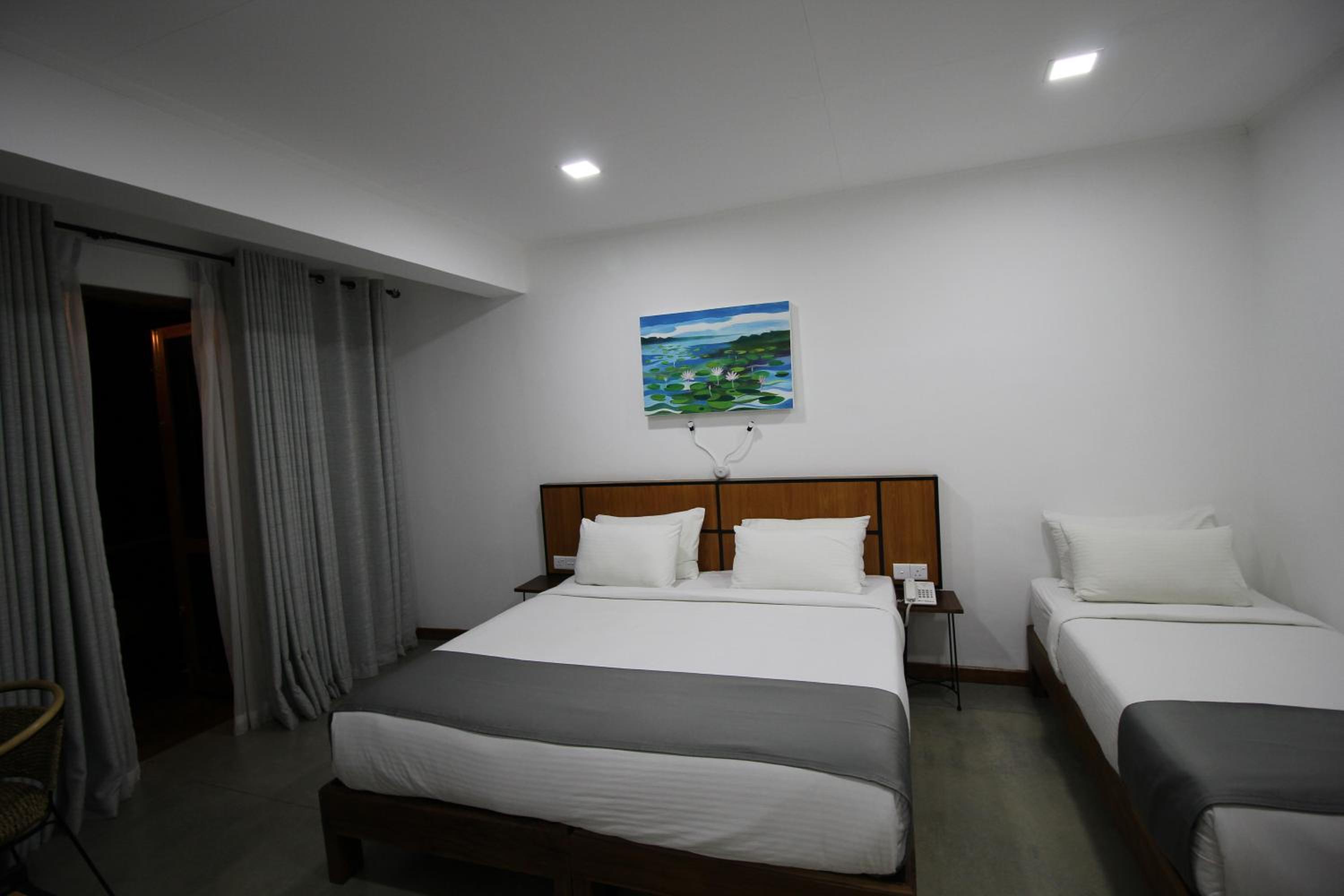 Deluxe Triple Room