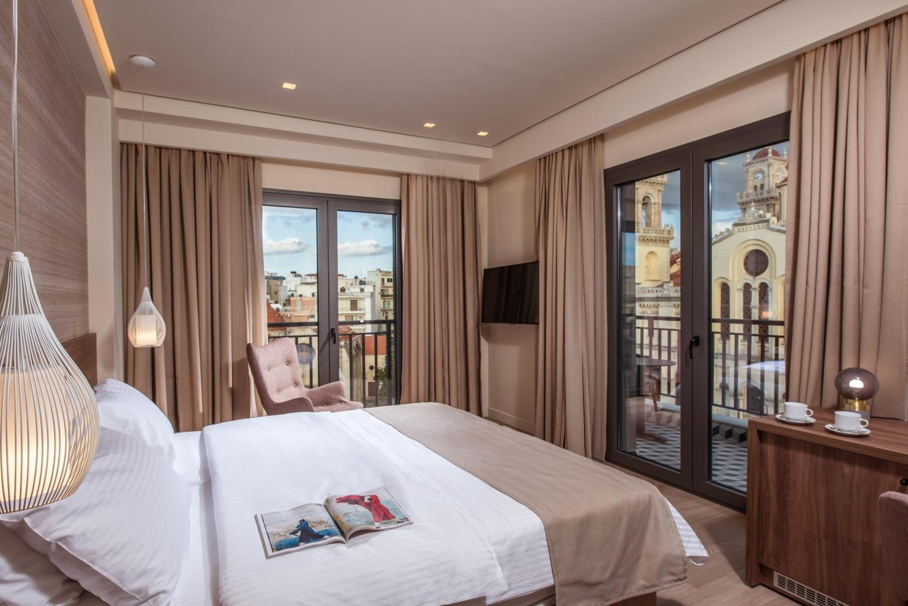 Deluxe Room with Balcony and City View - Photo 1