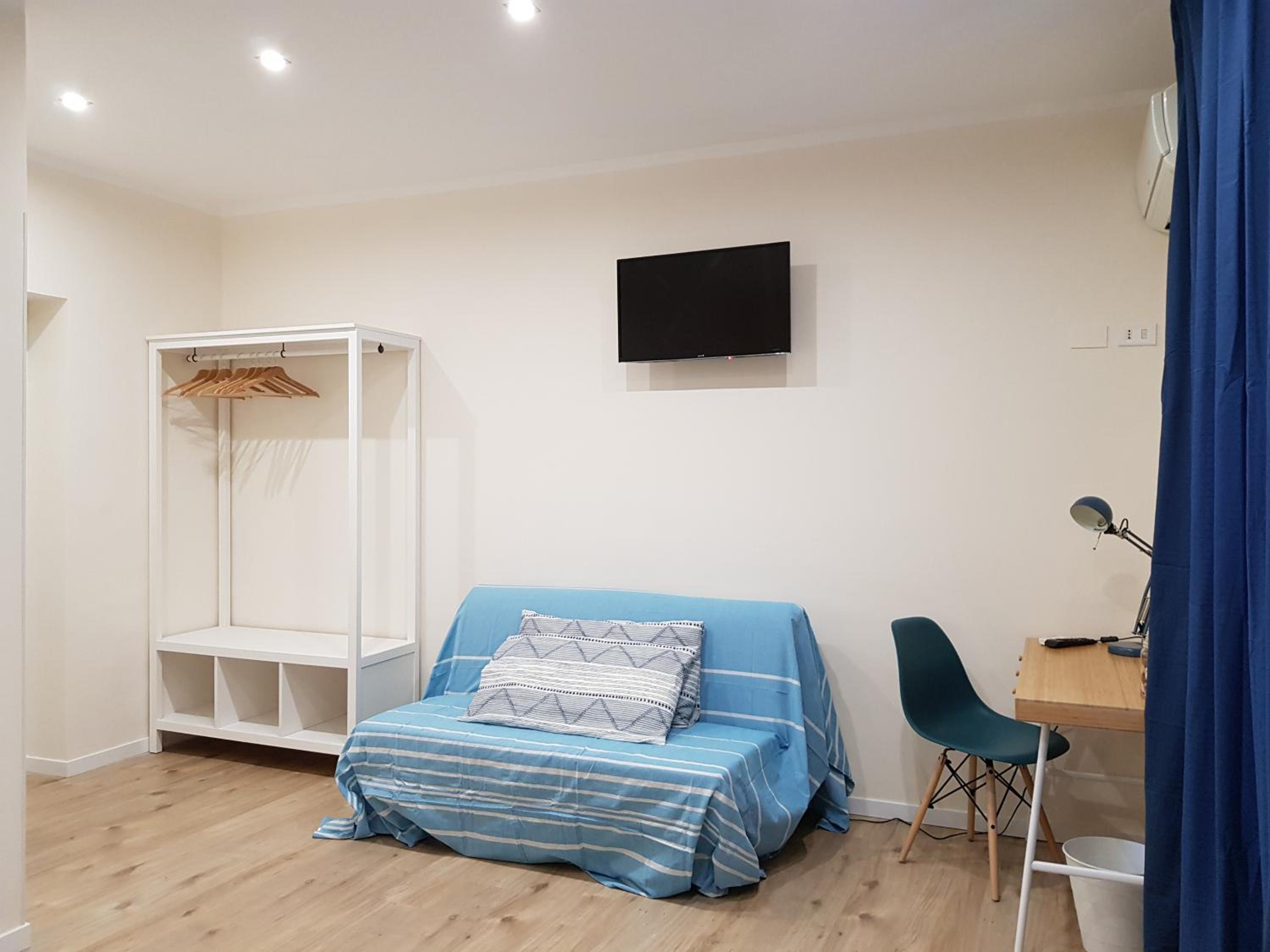 Quadruple Room with Private Bathroom photo 3