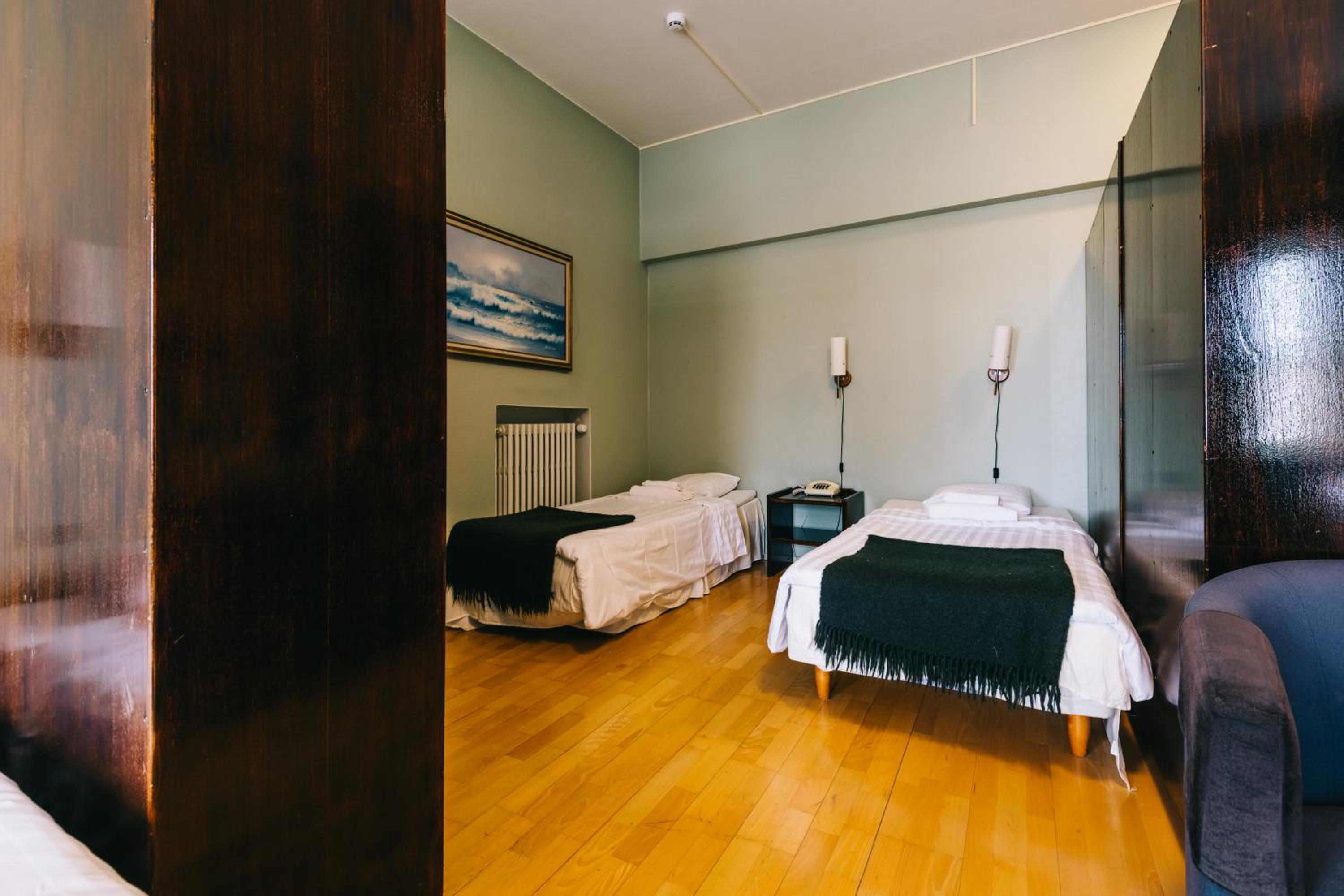Economy Quadruple Room - Photo 3