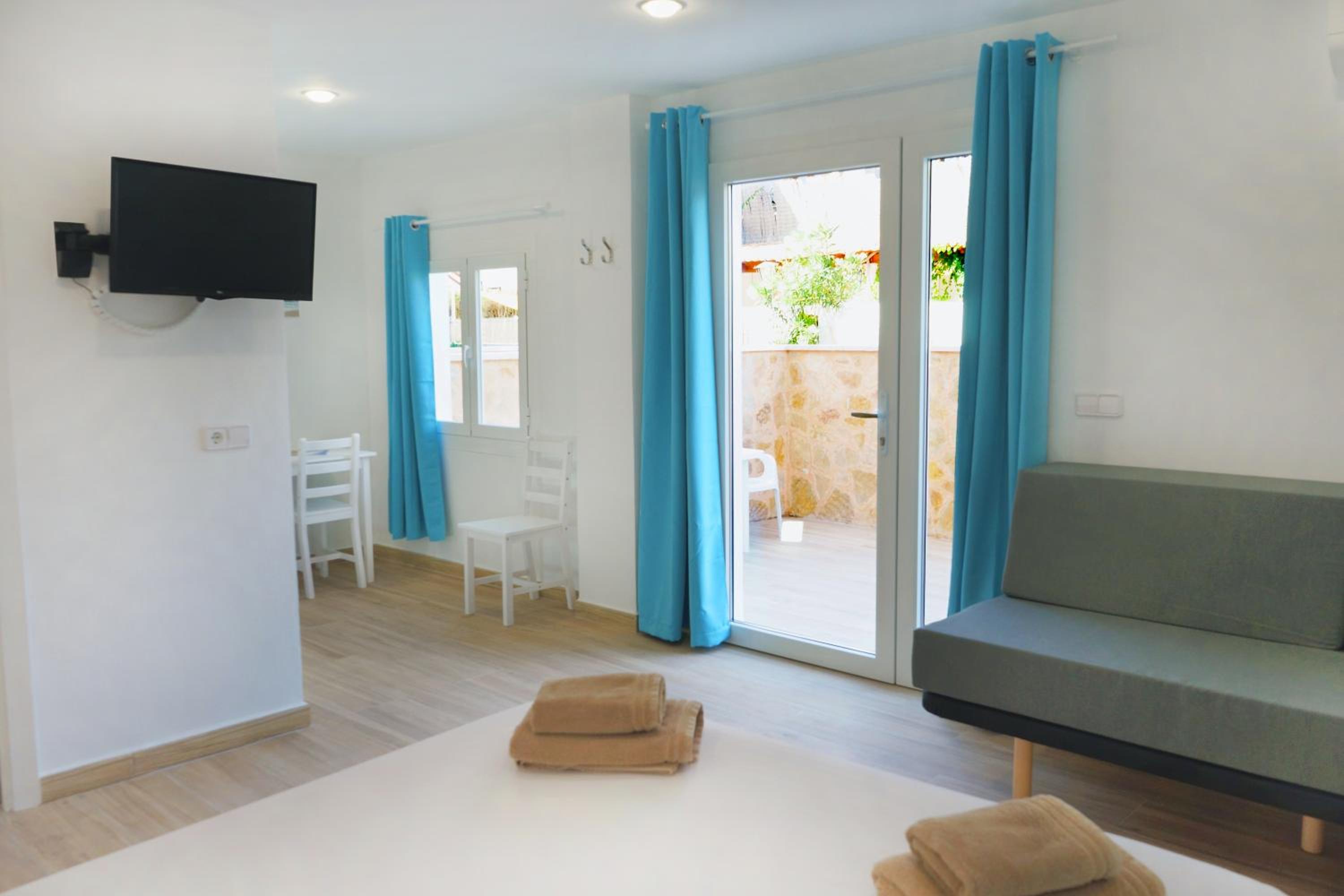 Ground Floor Studio with Terrace and Kitchen (2-3 Adults)