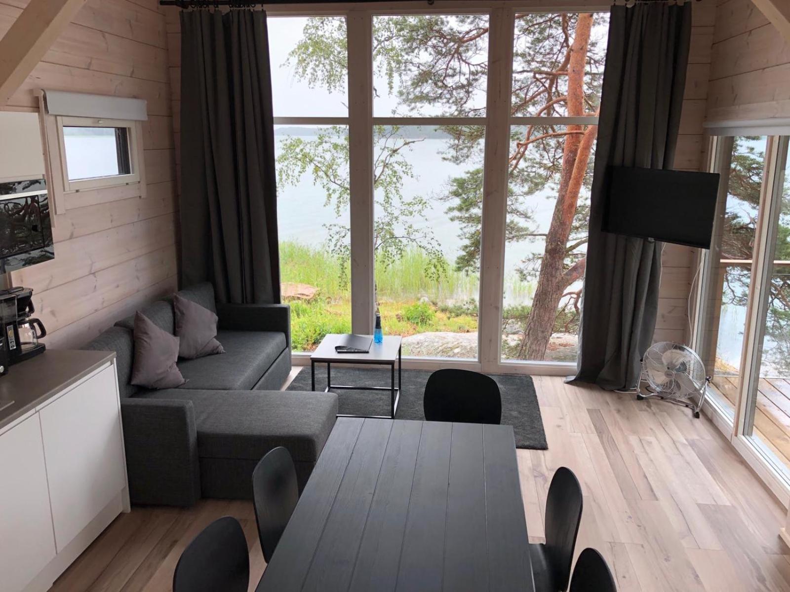 1 Bedroom Holiday House with Sea View and Sauna - Photo 1