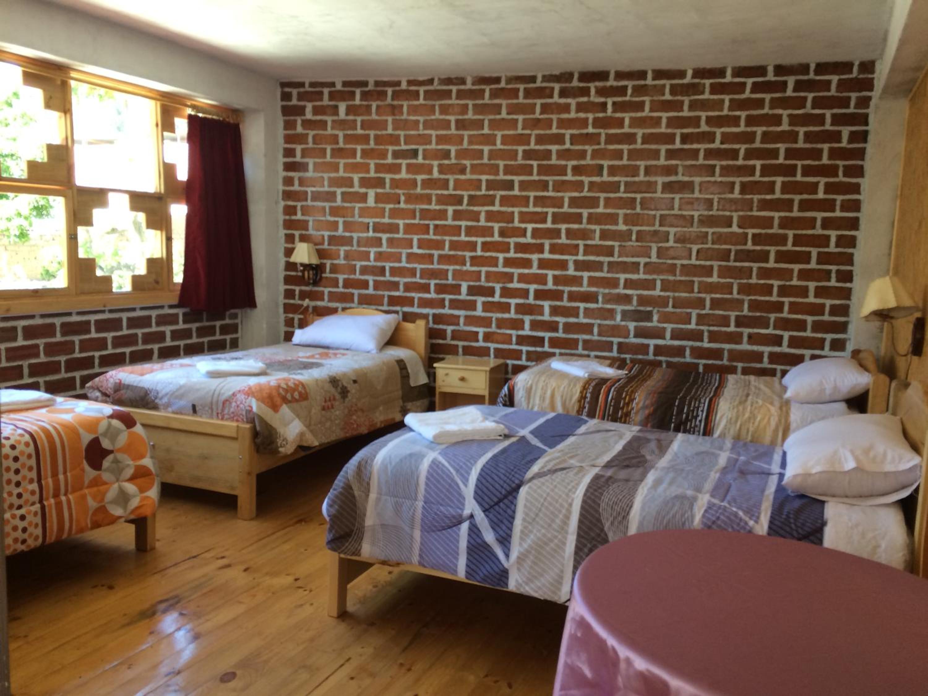 Quadruple Room with Private Bathroom photo 1