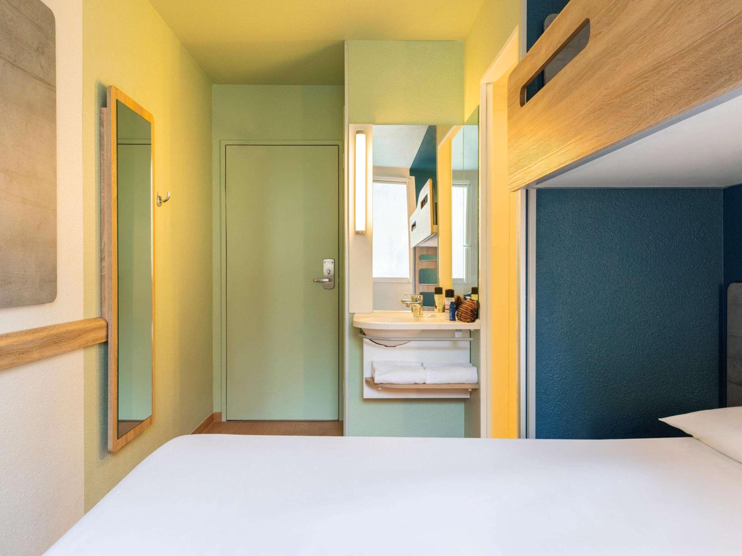 Room with One Queen Bed and One Bunk Bed photo 2