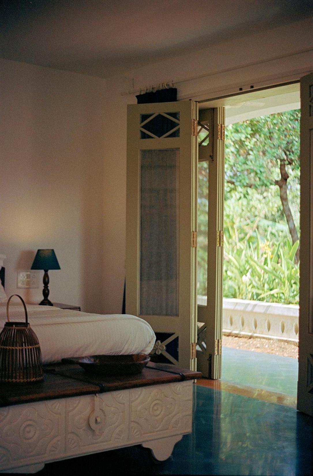 Banyan Room with Garden View - Two personalised Ayurvedic therapies. Restorative yoga sessions, Private consultations with our doctors