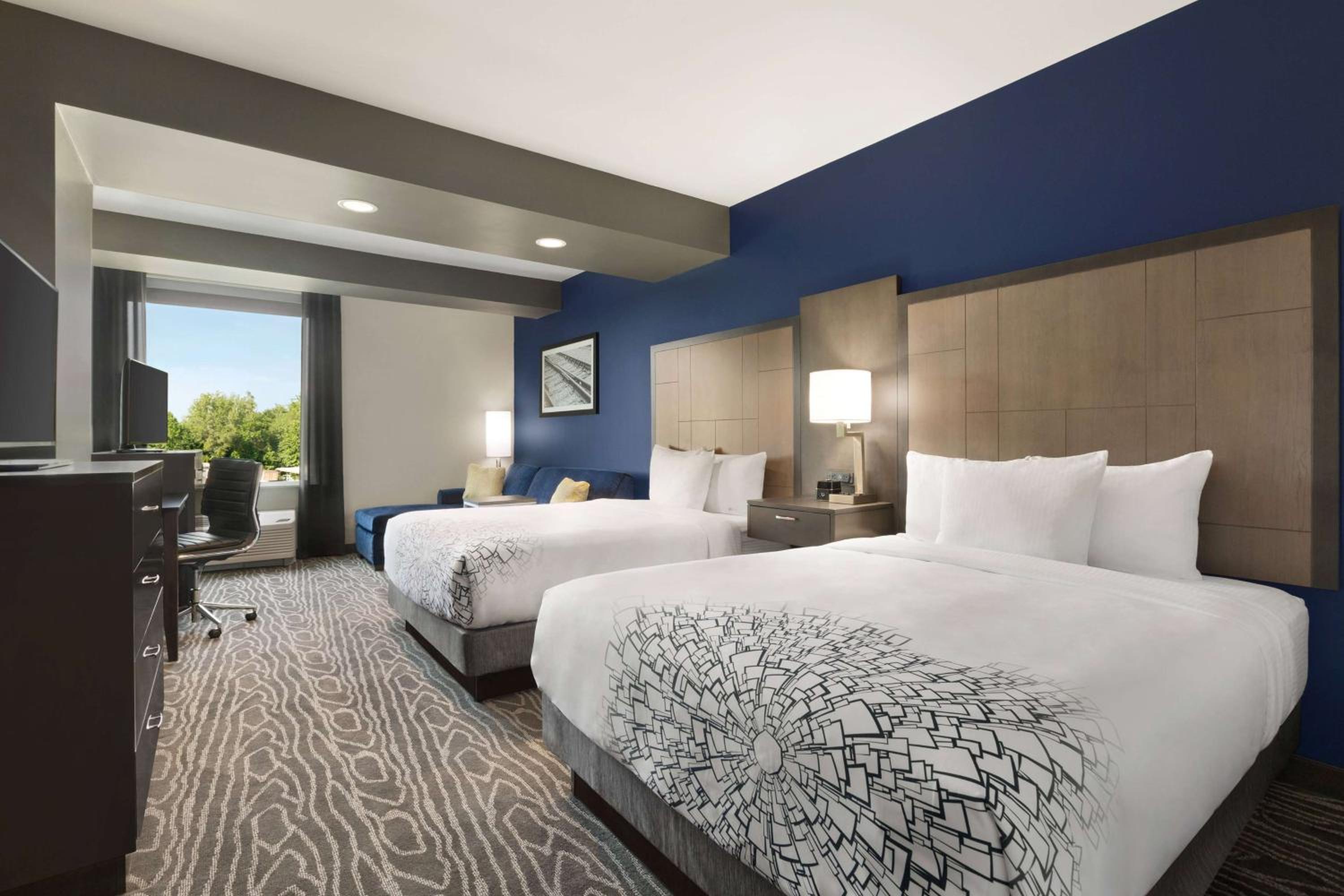 Queen Room with Two Queen Beds and Sofa Bed photo 1