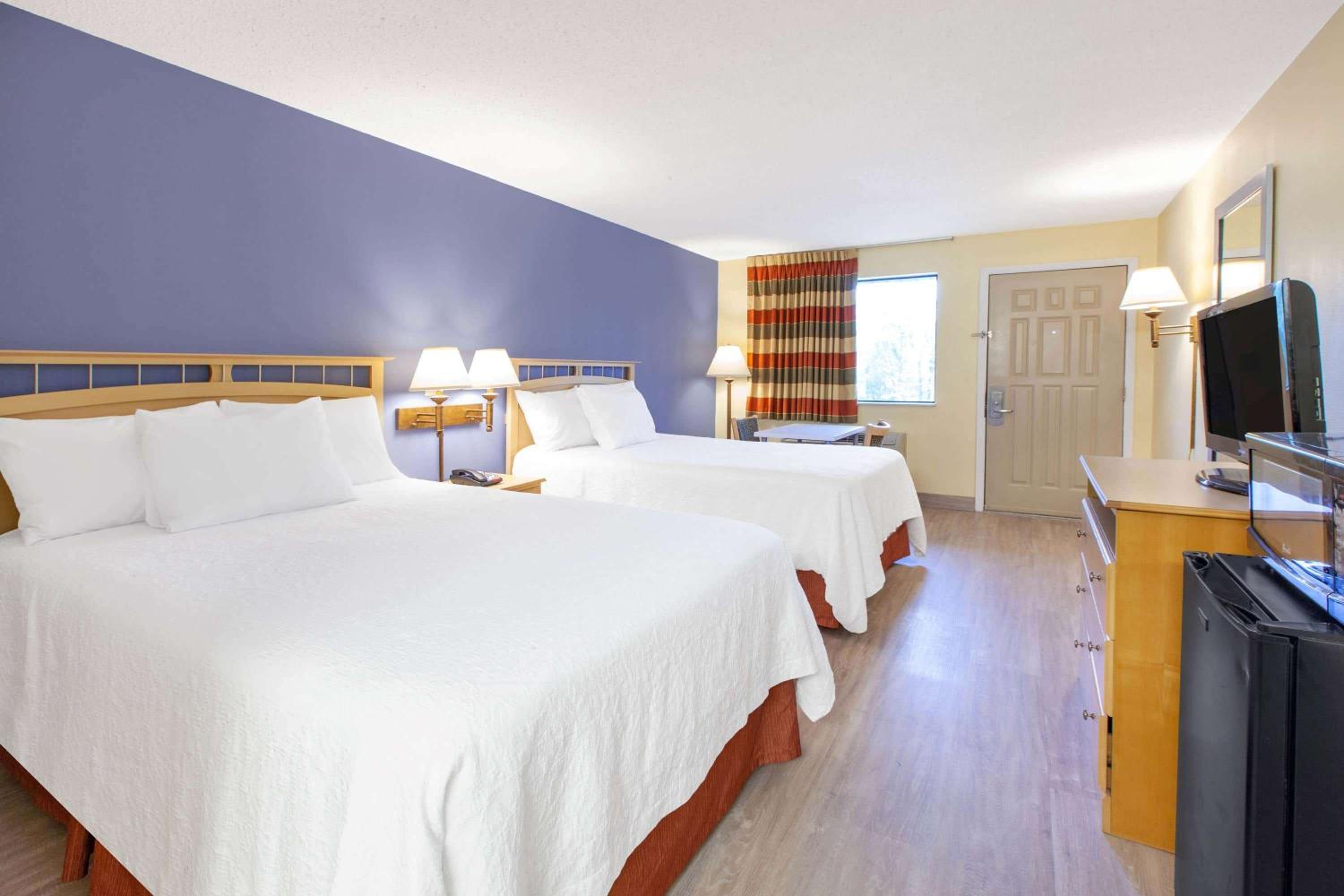Queen Room with Two Queen Beds - Pet Friendly/Non-Smoking - Photo 1