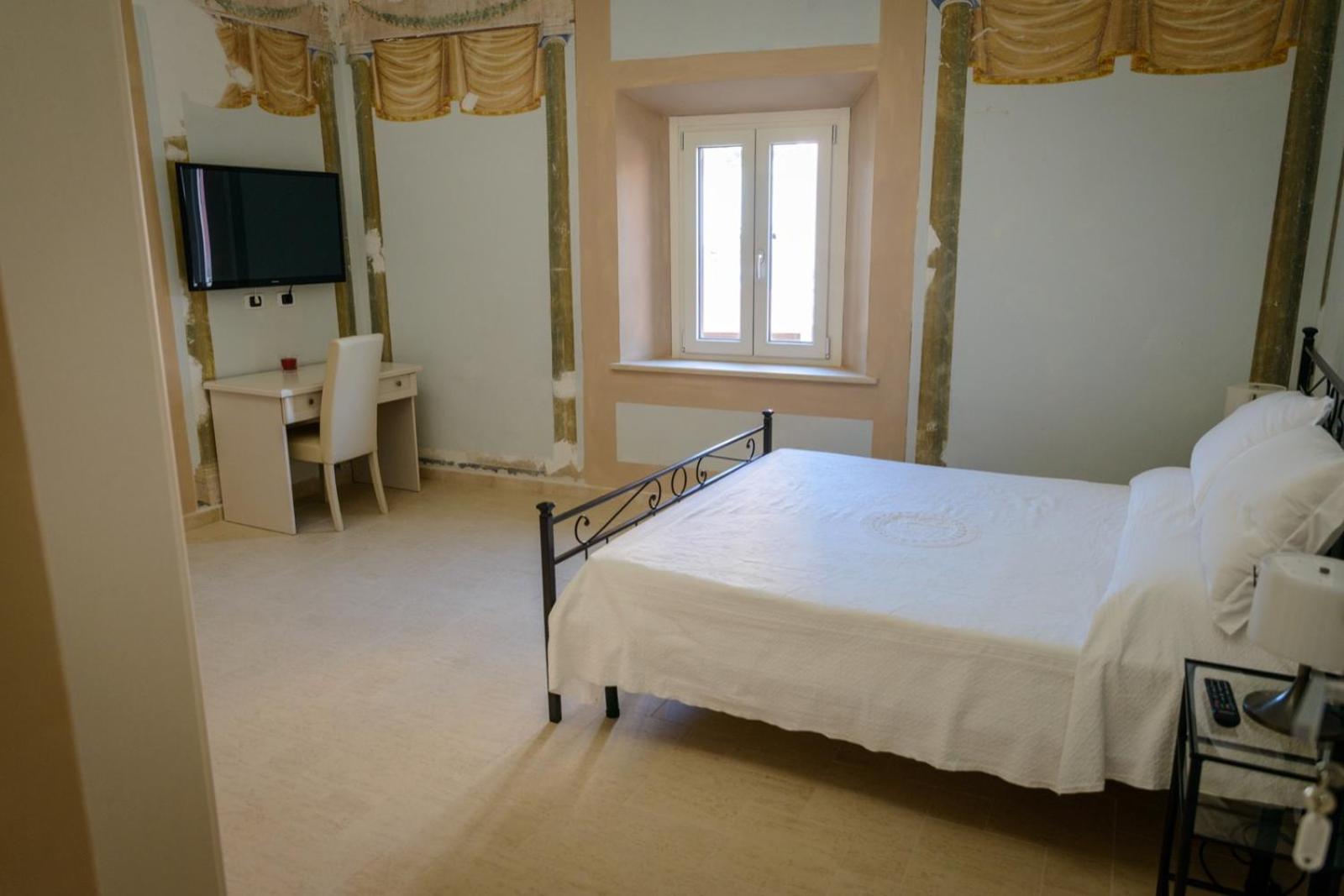 Deluxe Quadruple Room - Photo 3