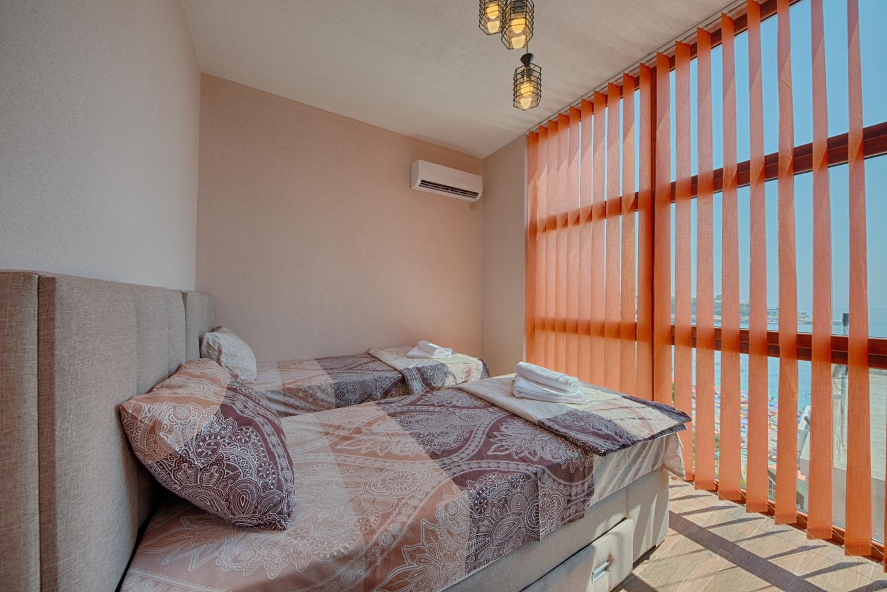 Two-Bedroom Apartment with Balcony and Terrace
