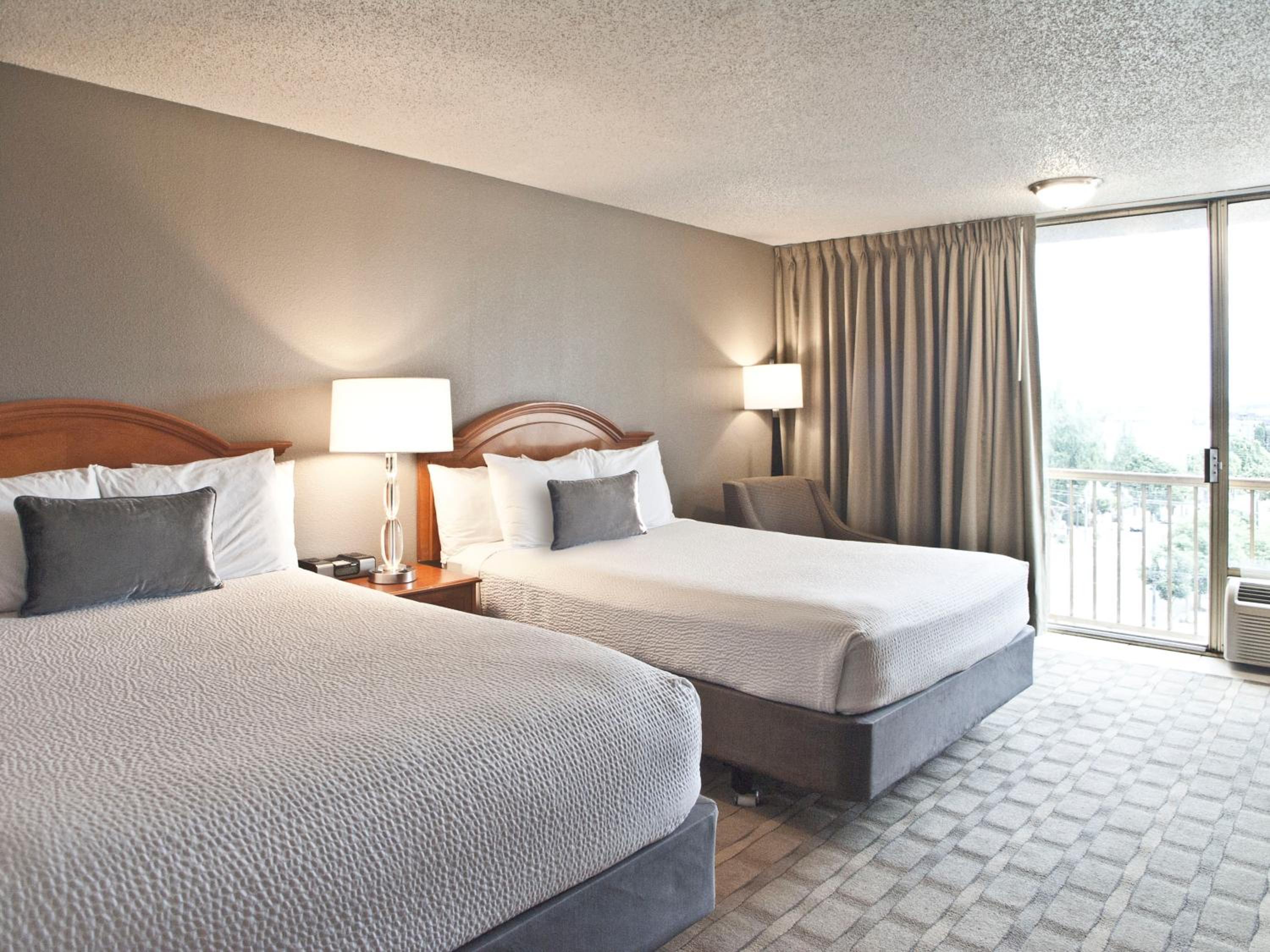 Queen Room with Two Queen Beds - Photo 1